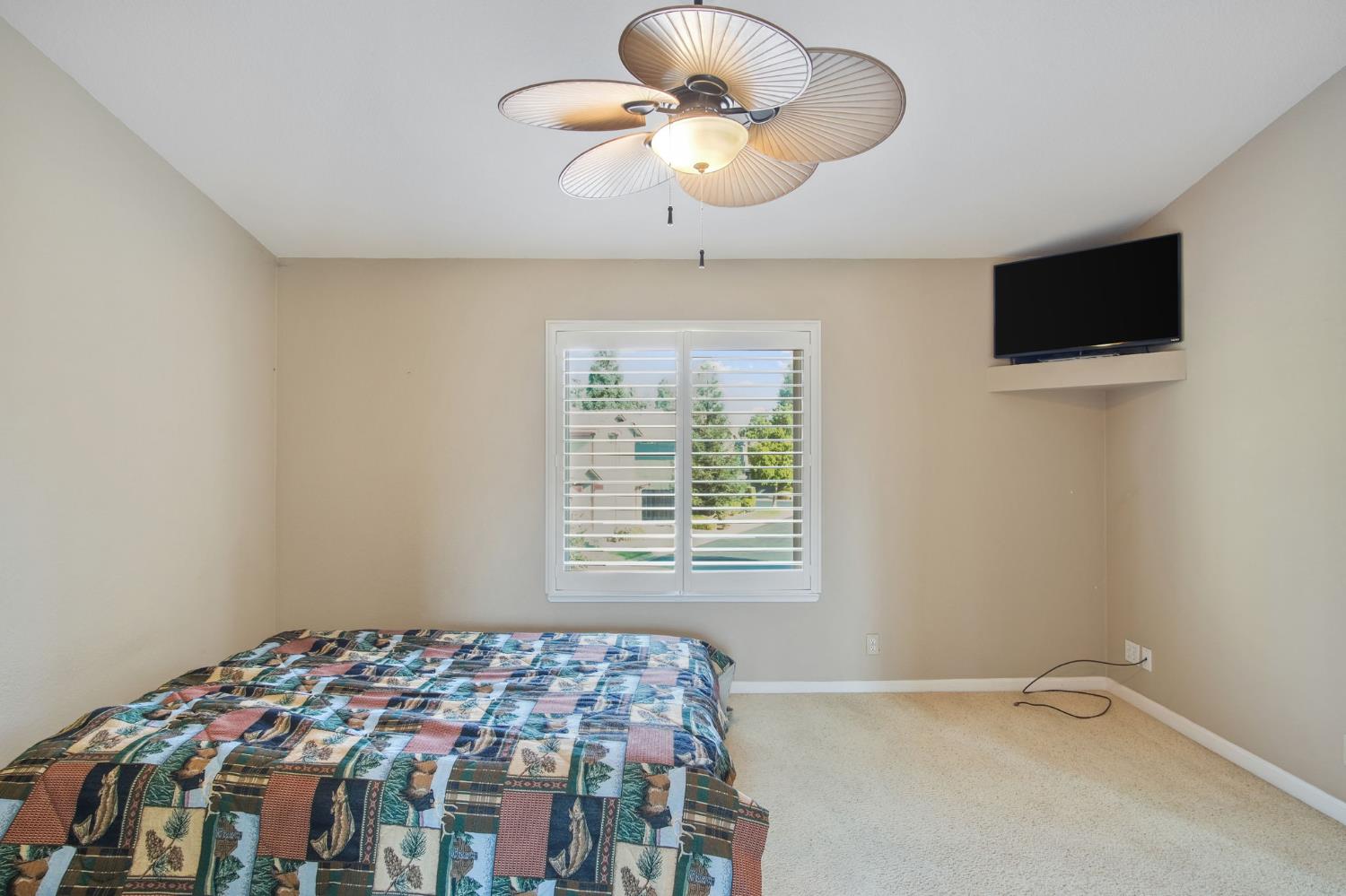 1345 Alex Circle Turlock, CA 95382 - Photo 24 of 35 a bedroom with bed and window