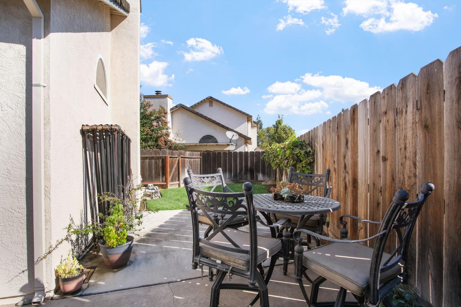 1345 Alex Circle Turlock, CA 95382 - Photo 29 of 35 a view of a house with backyard and sitting area