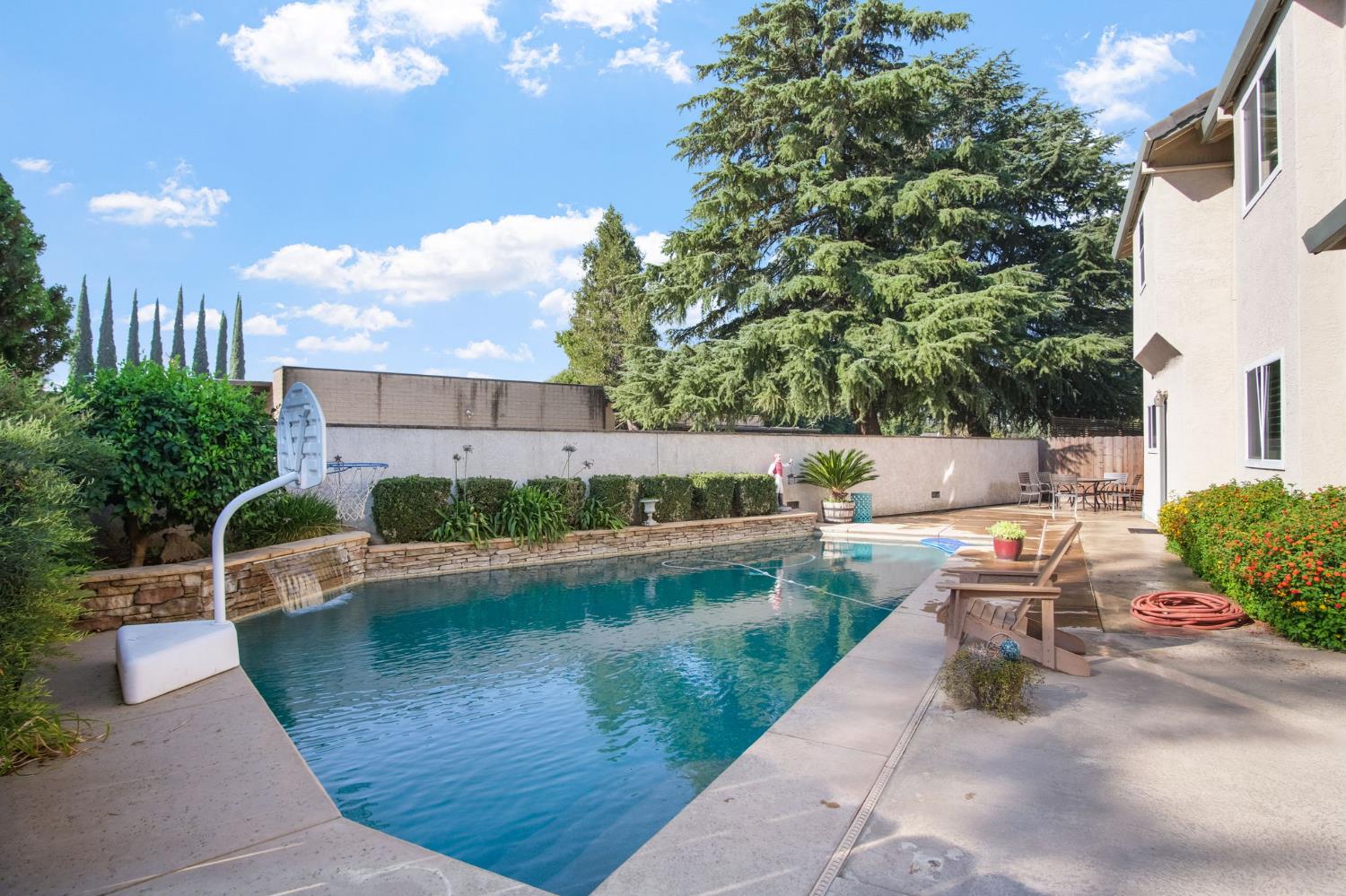 1345 Alex Circle Turlock, CA 95382 - Photo 32 of 35 a view of a patio with couches table and chairs and potted plants