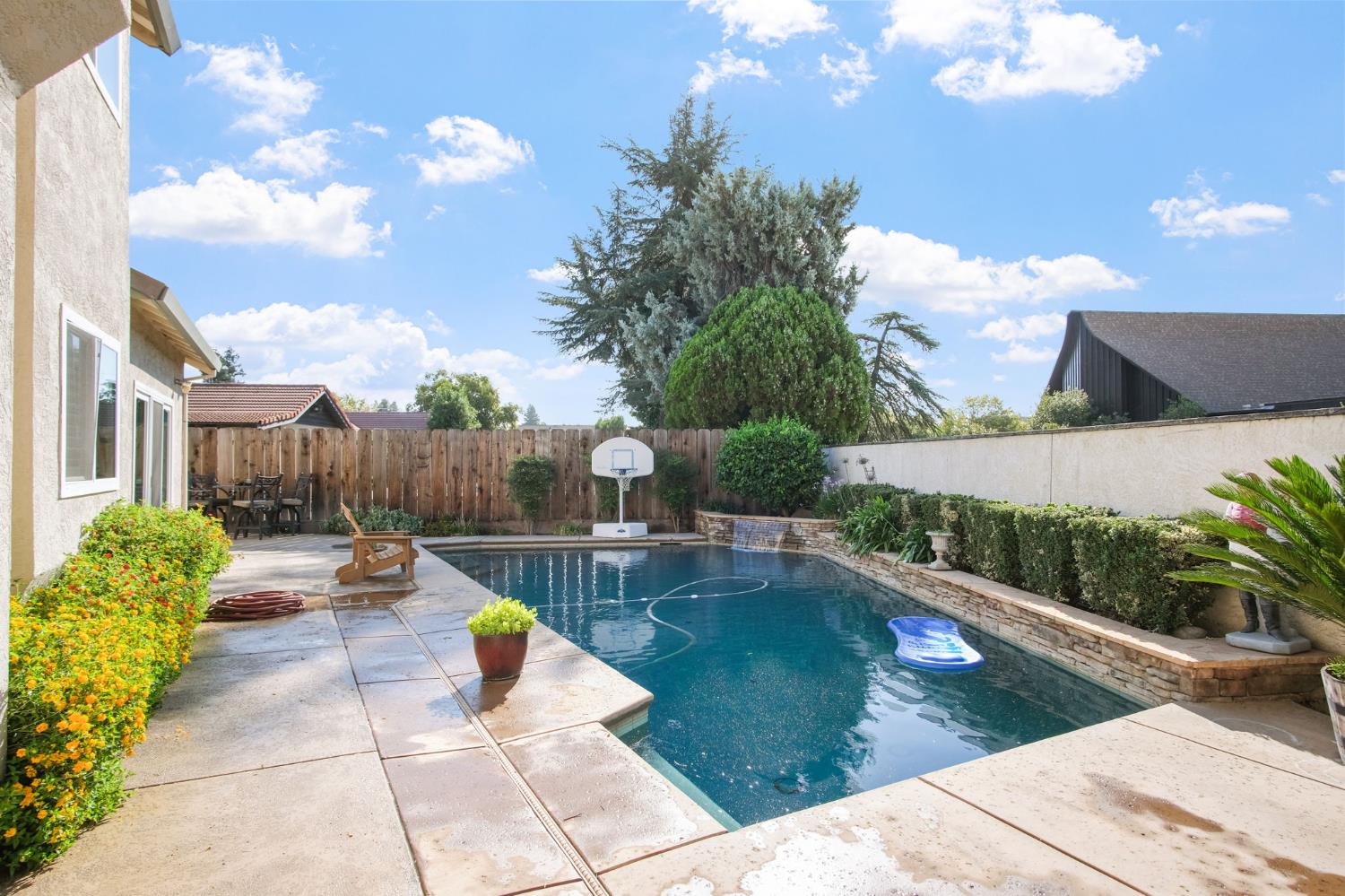 1345 Alex Circle Turlock, CA 95382 - Photo 34 of 35 a view of a swimming pool with a patio