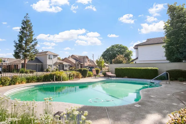 a view of a house with a swimming pool