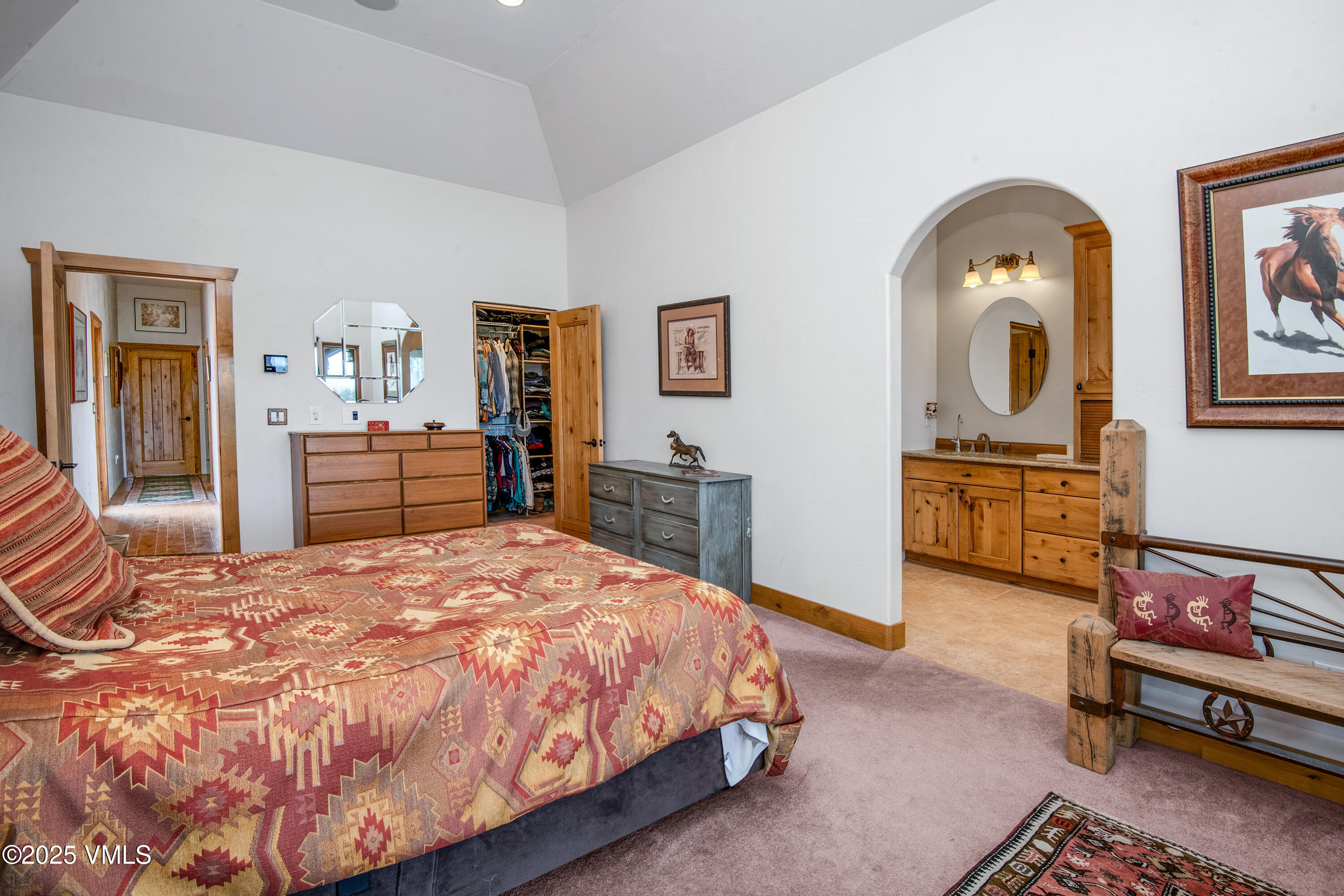 14555 Highway 6 Eagle, CO 81631 - Photo 15 of 61 a bedroom with a bed and a dresser