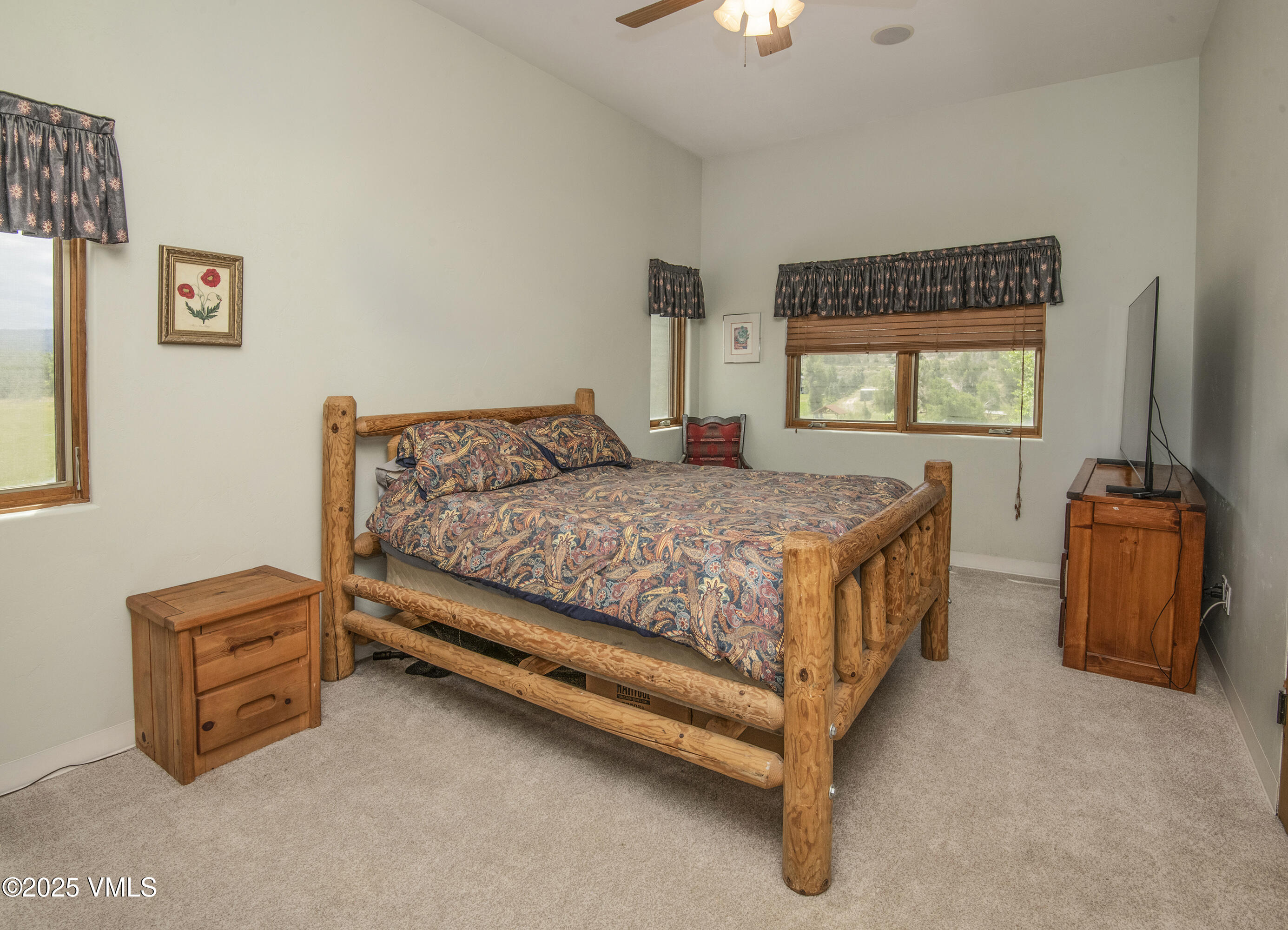 14555 Highway 6 Eagle, CO 81631 - Photo 24 of 61 a bedroom with a bed and a window