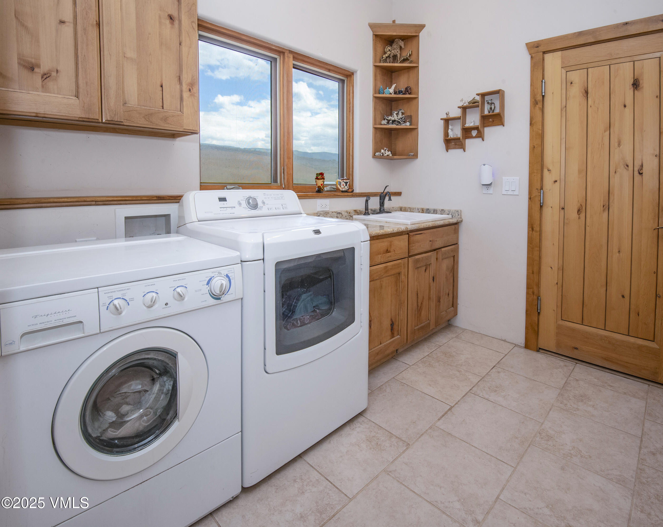 14555 Highway 6 Eagle, CO 81631 - Photo 26 of 61 a utility room with sink dryer and washer