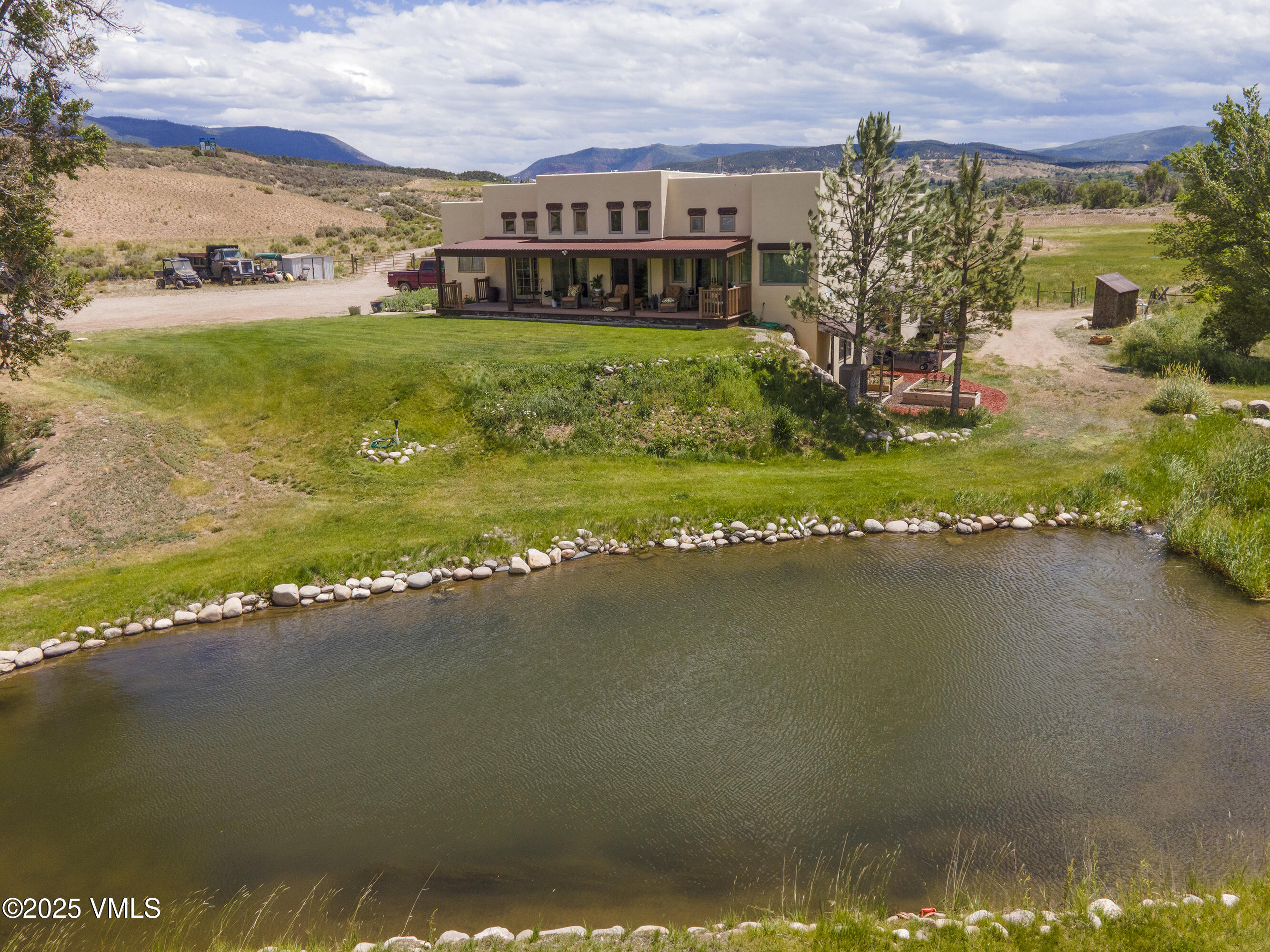 14555 Highway 6 Eagle, CO 81631 - Photo 33 of 61 a view of a lake with a big yard