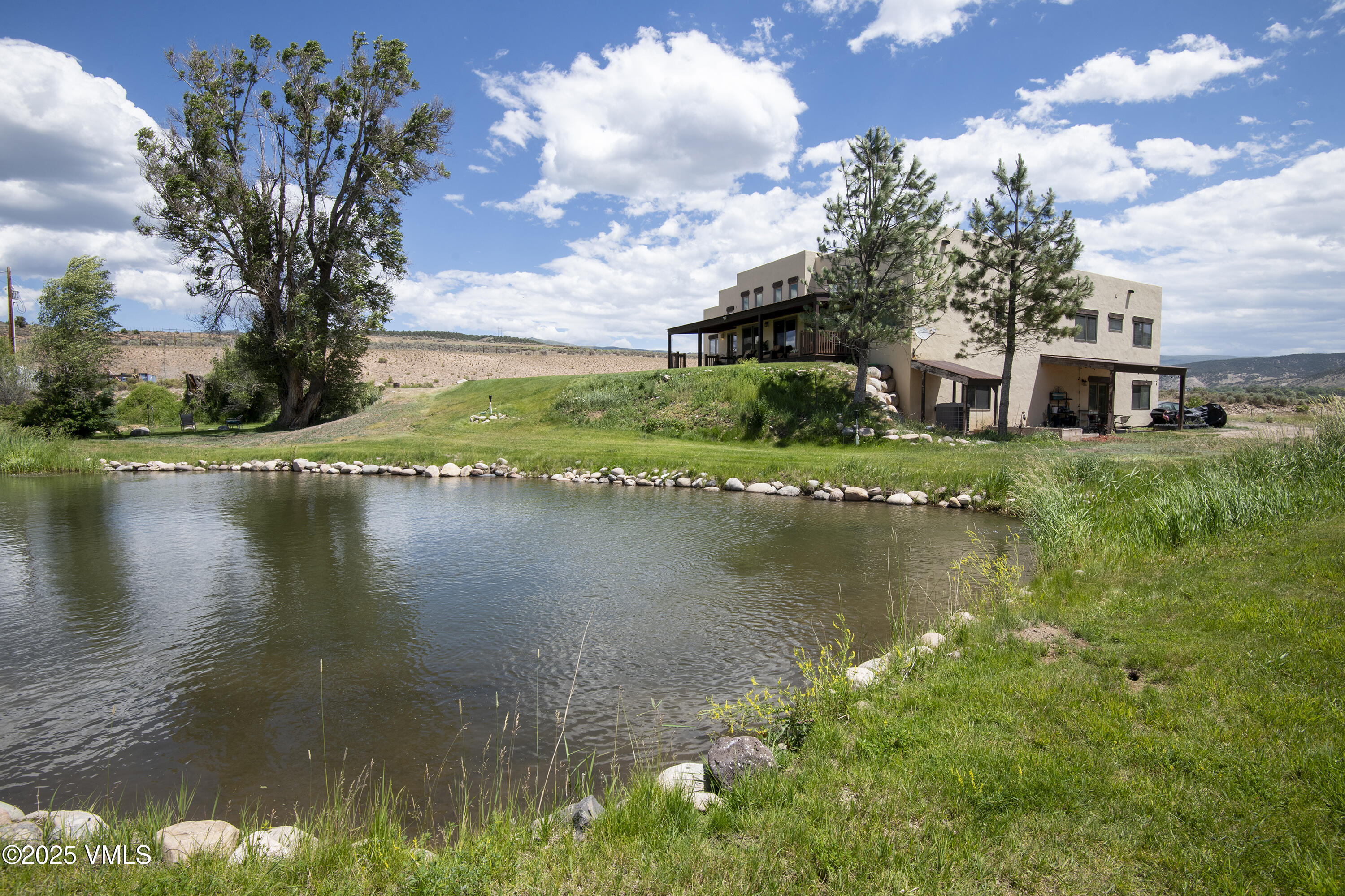 14555 Highway 6 Eagle, CO 81631 - Photo 34 of 61 a view of residential house with outdoor space and lake