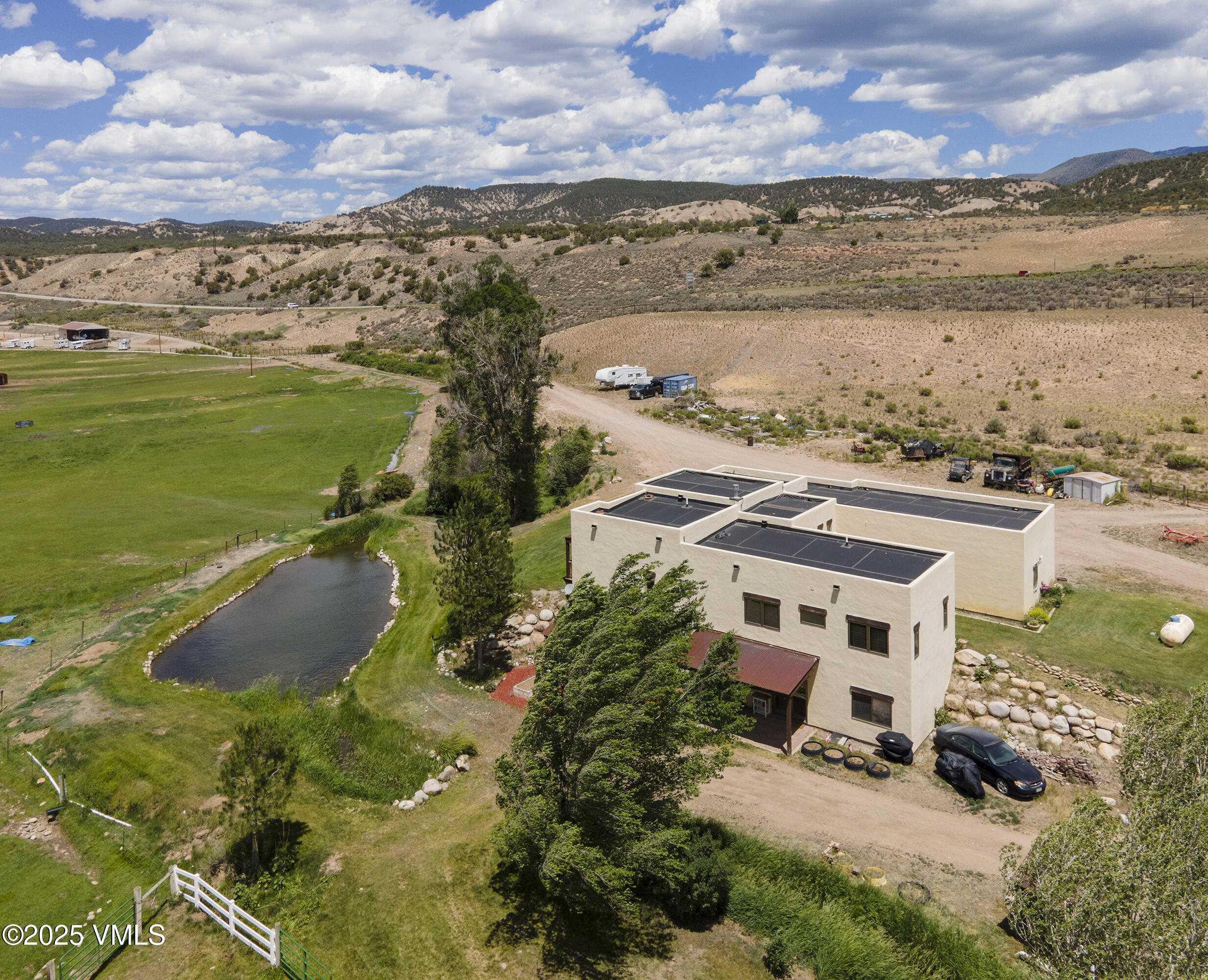 14555 Highway 6 Eagle, CO 81631 - Photo 38 of 61 a view of a lake with a building in the background