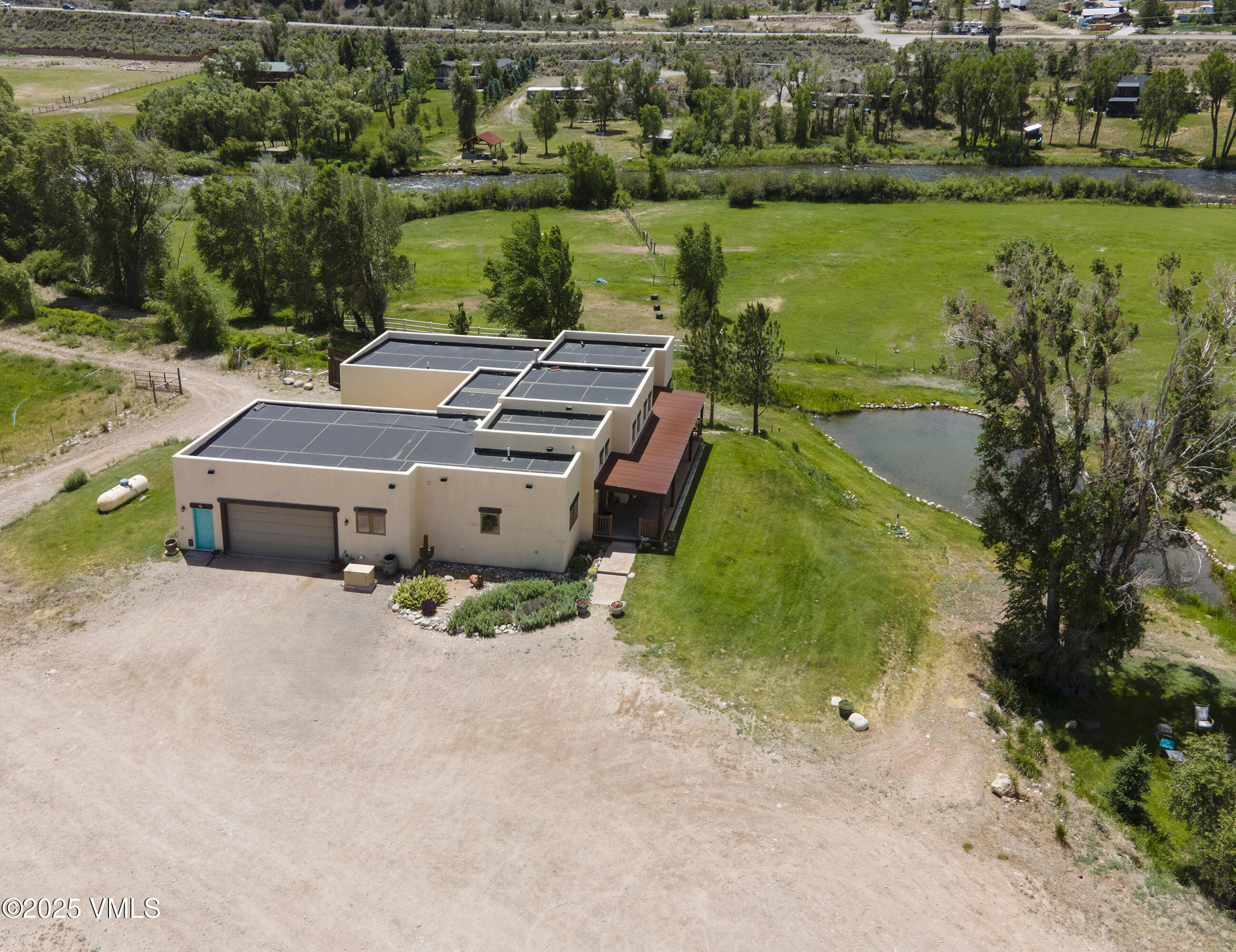 14555 Highway 6 Eagle, CO 81631 - Photo 39 of 61 an aerial view of a house with garden space and ocean view