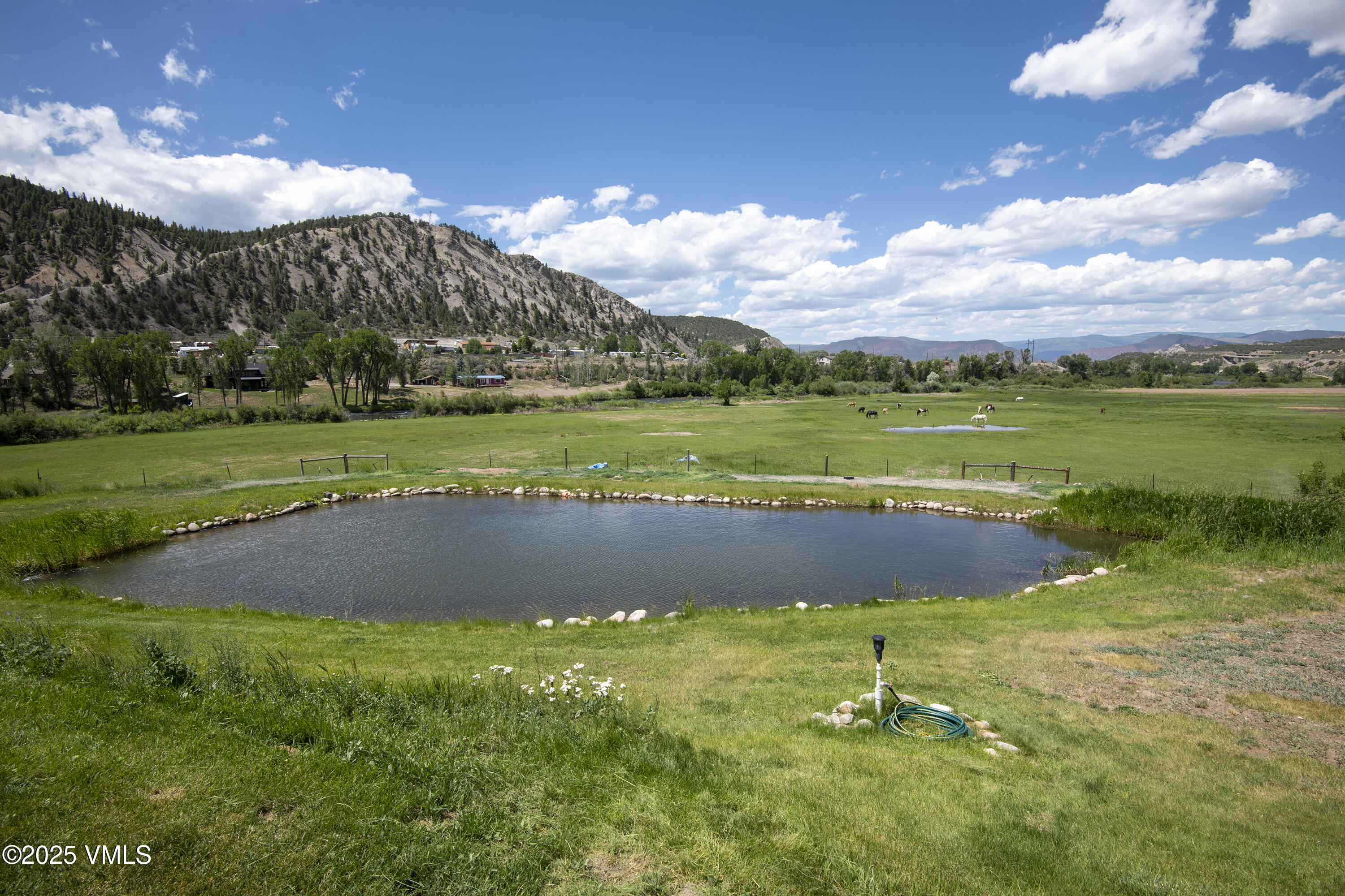 14555 Highway 6 Eagle, CO 81631 - Photo 45 of 61 a view of a lake in front of house