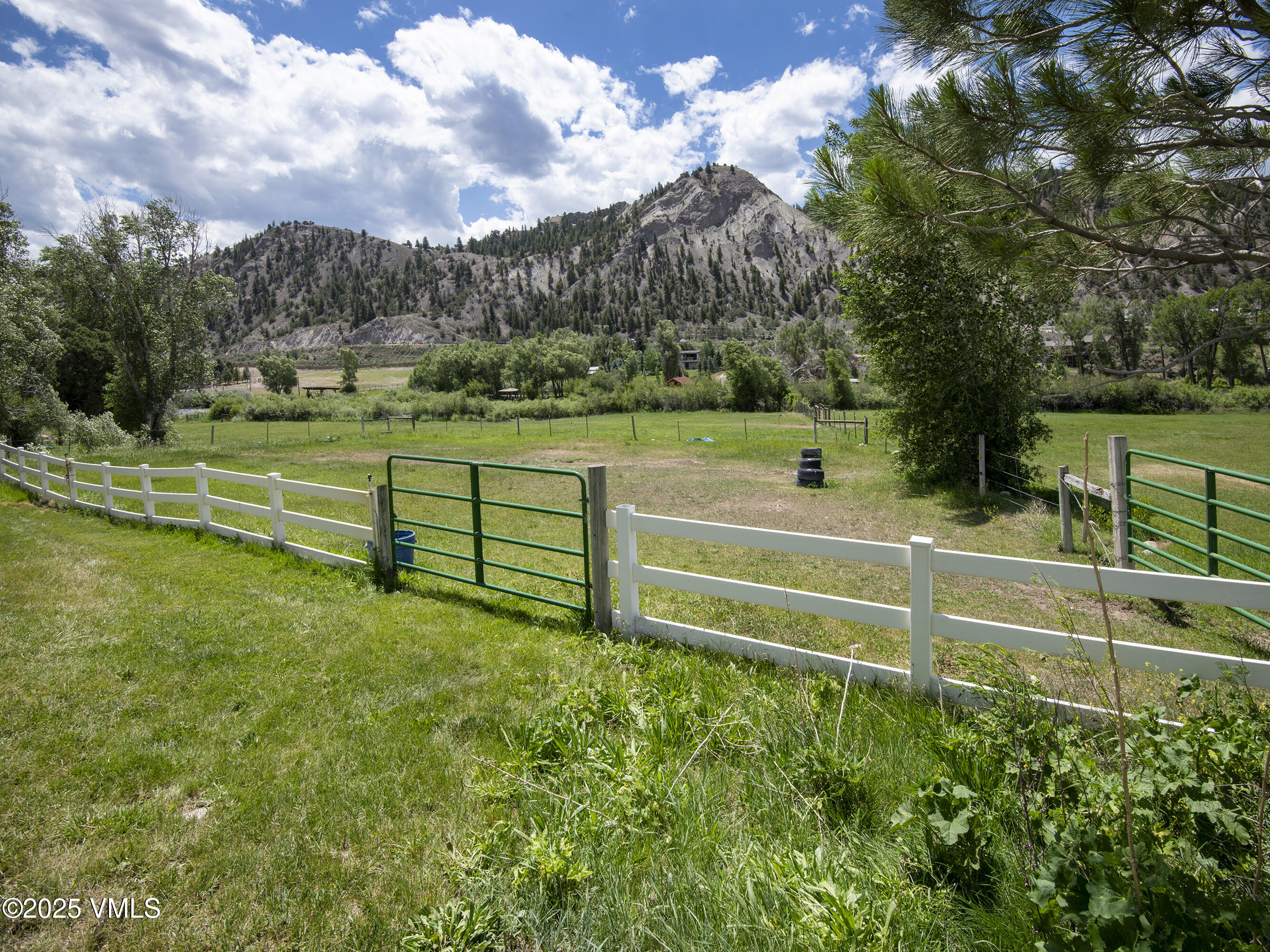14555 Highway 6 Eagle, CO 81631 - Photo 47 of 61 a view of a golf course with a lake