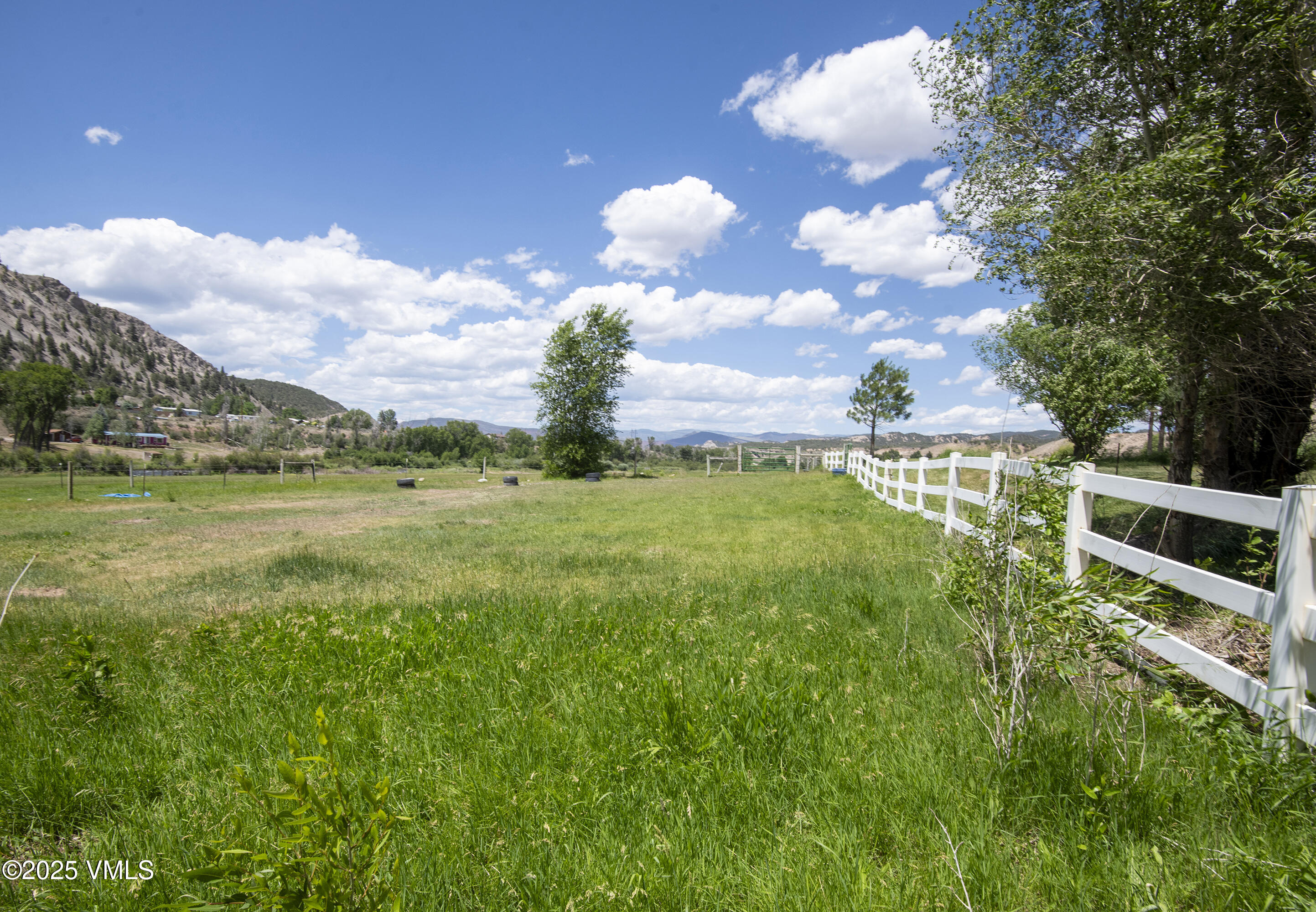14555 Highway 6 Eagle, CO 81631 - Photo 50 of 61 a view of a lake with houses in the back