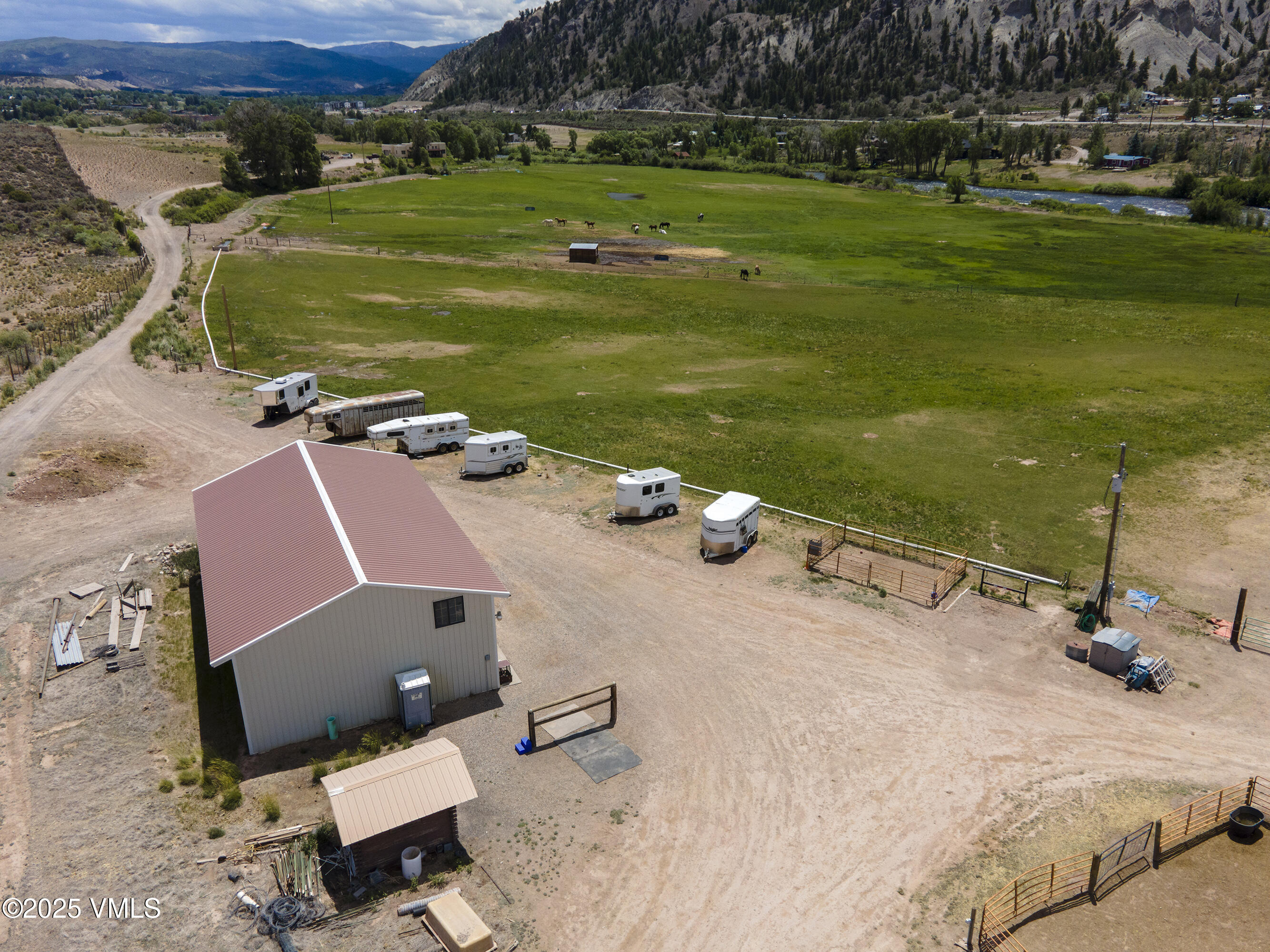 14555 Highway 6 Eagle, CO 81631 - Photo 60 of 61 an aerial view of a house with a yard basket ball court and outdoor seating