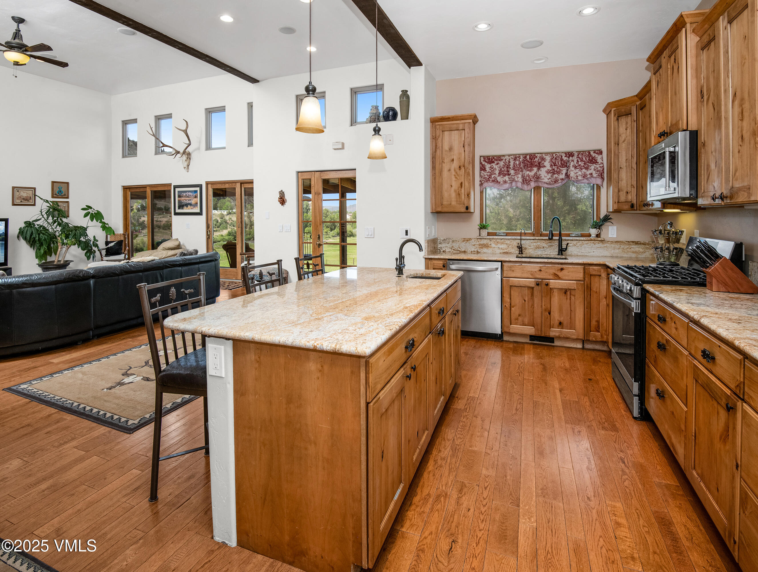 14555 Highway 6 Eagle, CO 81631 - Photo 9 of 61 a kitchen with granite countertop a sink appliances counter top space and furniture