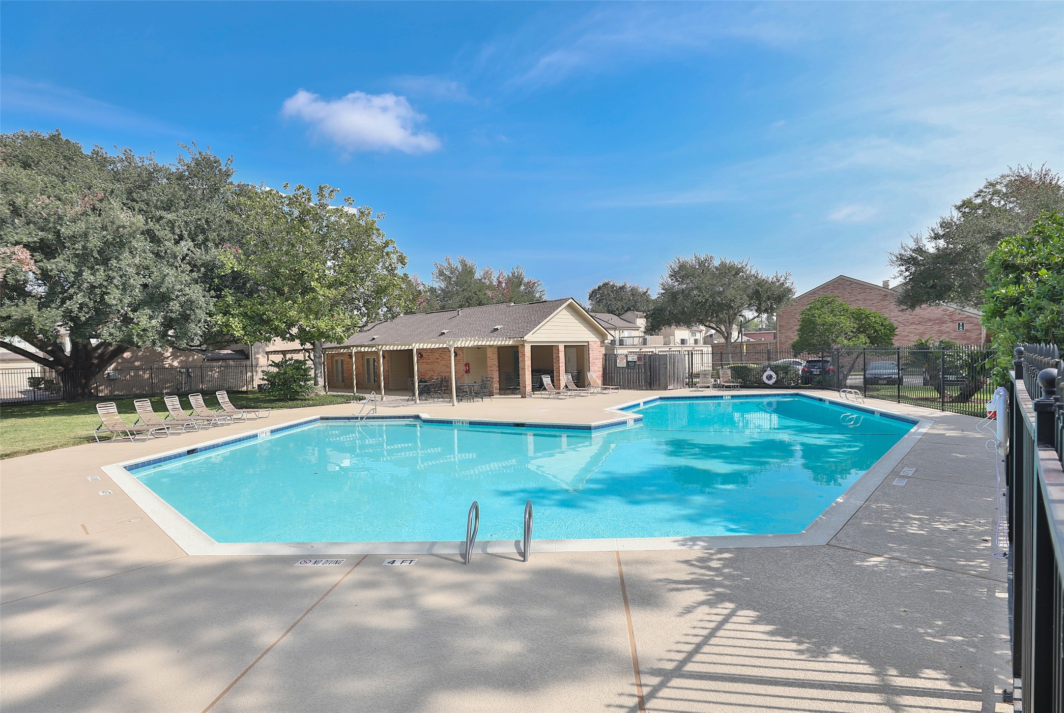 979 Memorial Village Drive, Unit 48 Houston, TX 77024 - Photo 18 of 18 a view of a house with a yard