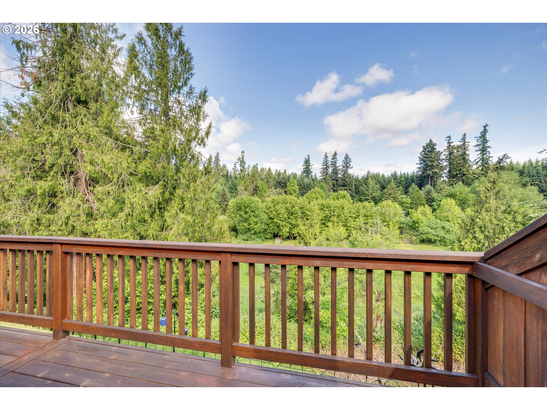 3769 10th Street Hubbard, OR 97032 - Photo 35 of 47 a view of a balcony with wooden floor