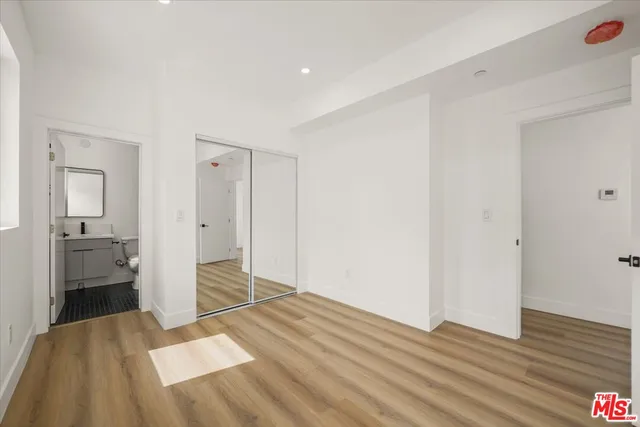 a bathroom with a tub and shower