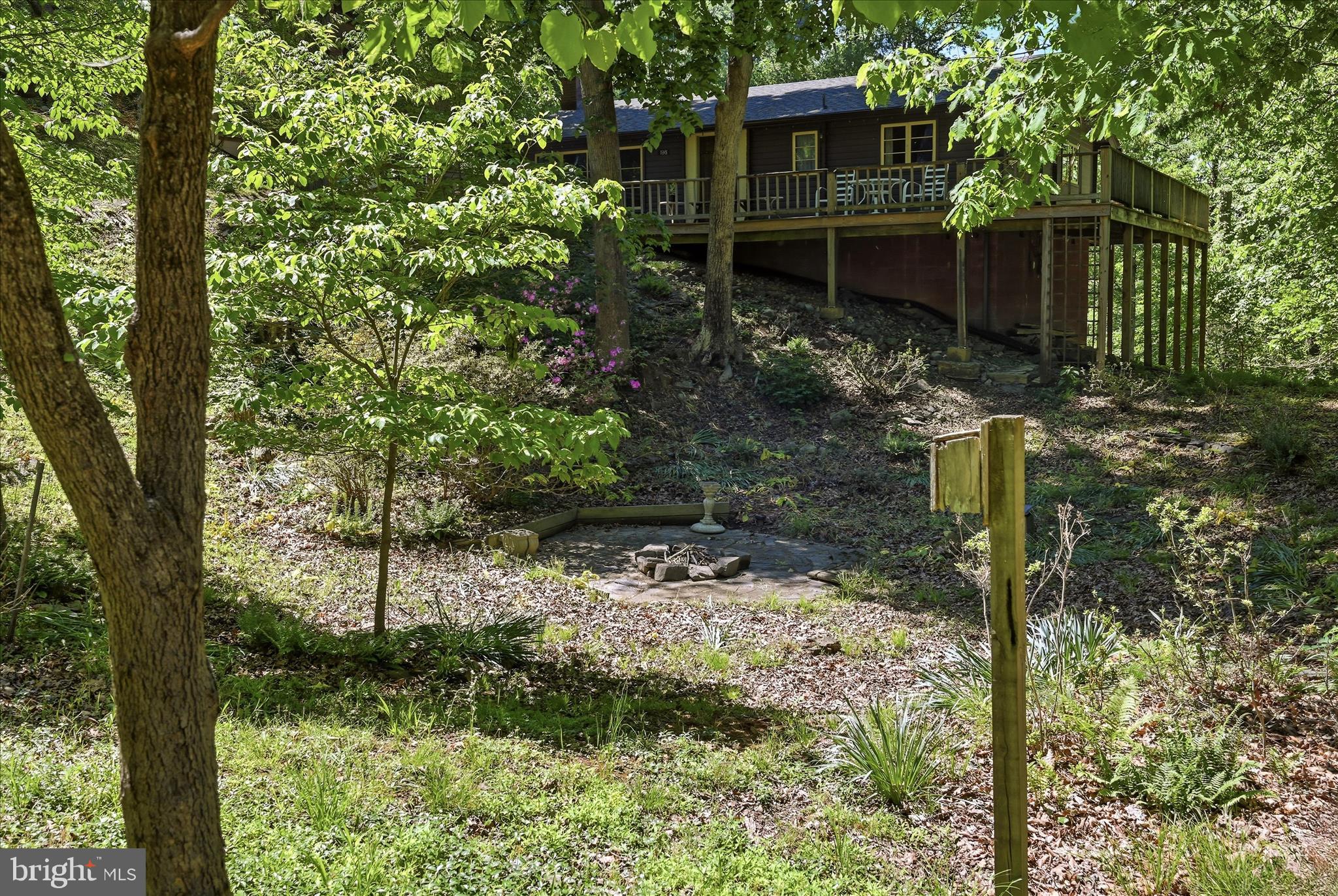 198 Spruce Road Front Royal, VA 22630 - Photo 57 of 59 a backyard of a house with lots of green space
