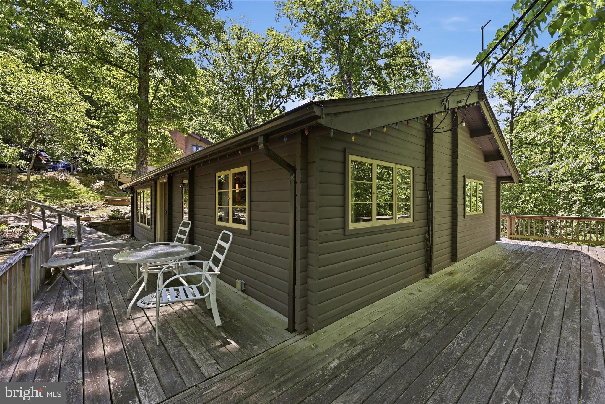 198 Spruce Road Front Royal, VA 22630 - Photo 9 of 59 a view of backyard with deck and seating area