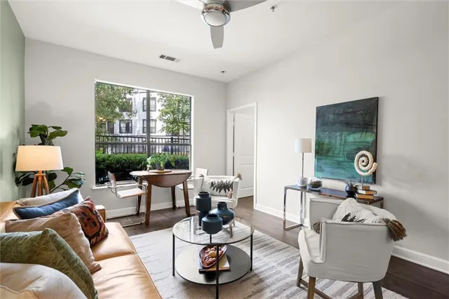 a living room with furniture and a window