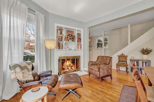 4249 North Hazel Street Chicago, IL 60613 - Photo 2 of 14 a living room with furniture and a fireplace