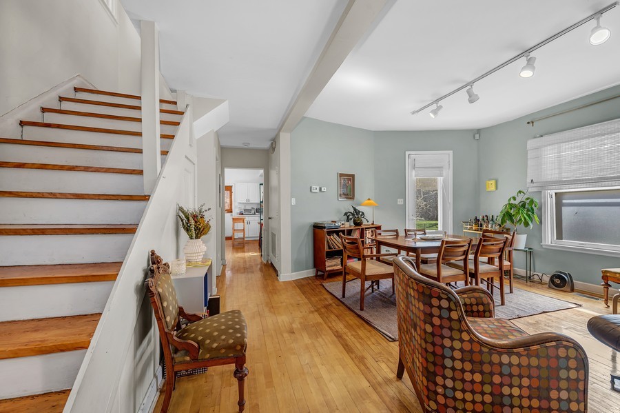 4249 North Hazel Street Chicago, IL 60613 - Photo 3 of 14 a view of a livingroom with furniture and wooden floor