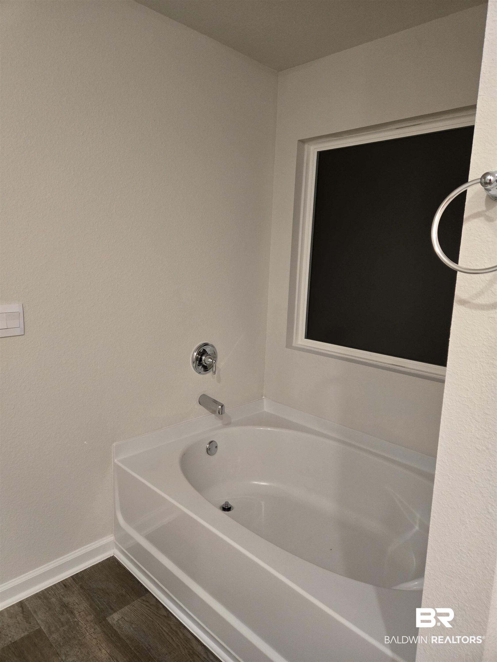 24194 Veranda Circle Elberta, AL 36530 - Photo 29 of 31 Bathroom with wood-type flooring and a bathing tub