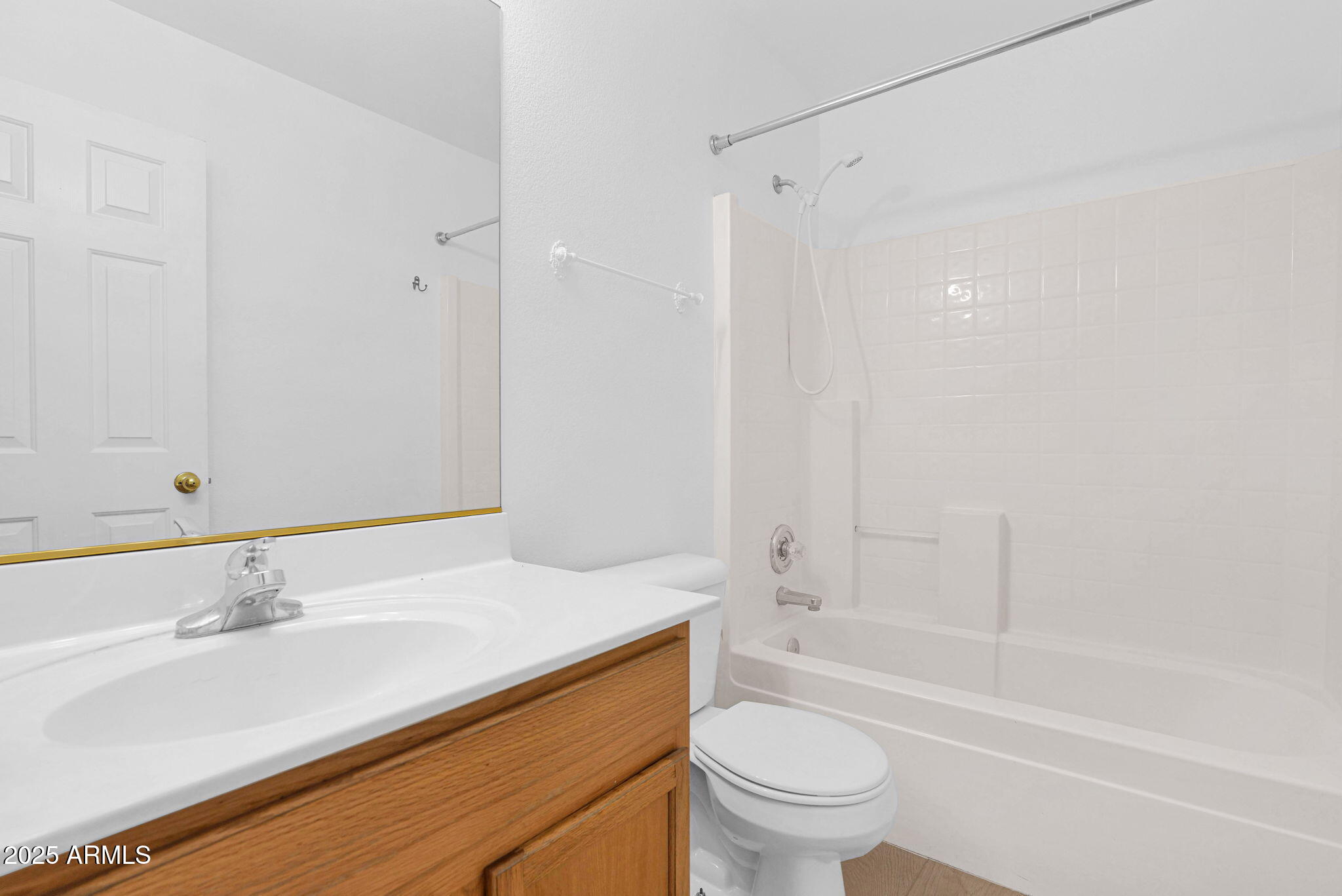 882 East Monterey Street Chandler, AZ 85225 - Photo 17 of 33 a bathroom with a sink toilet vanity and shower