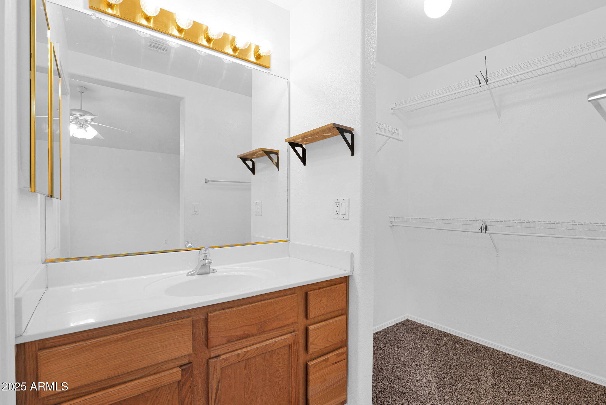 882 East Monterey Street Chandler, AZ 85225 - Photo 22 of 33 a bathroom with a sink and mirror