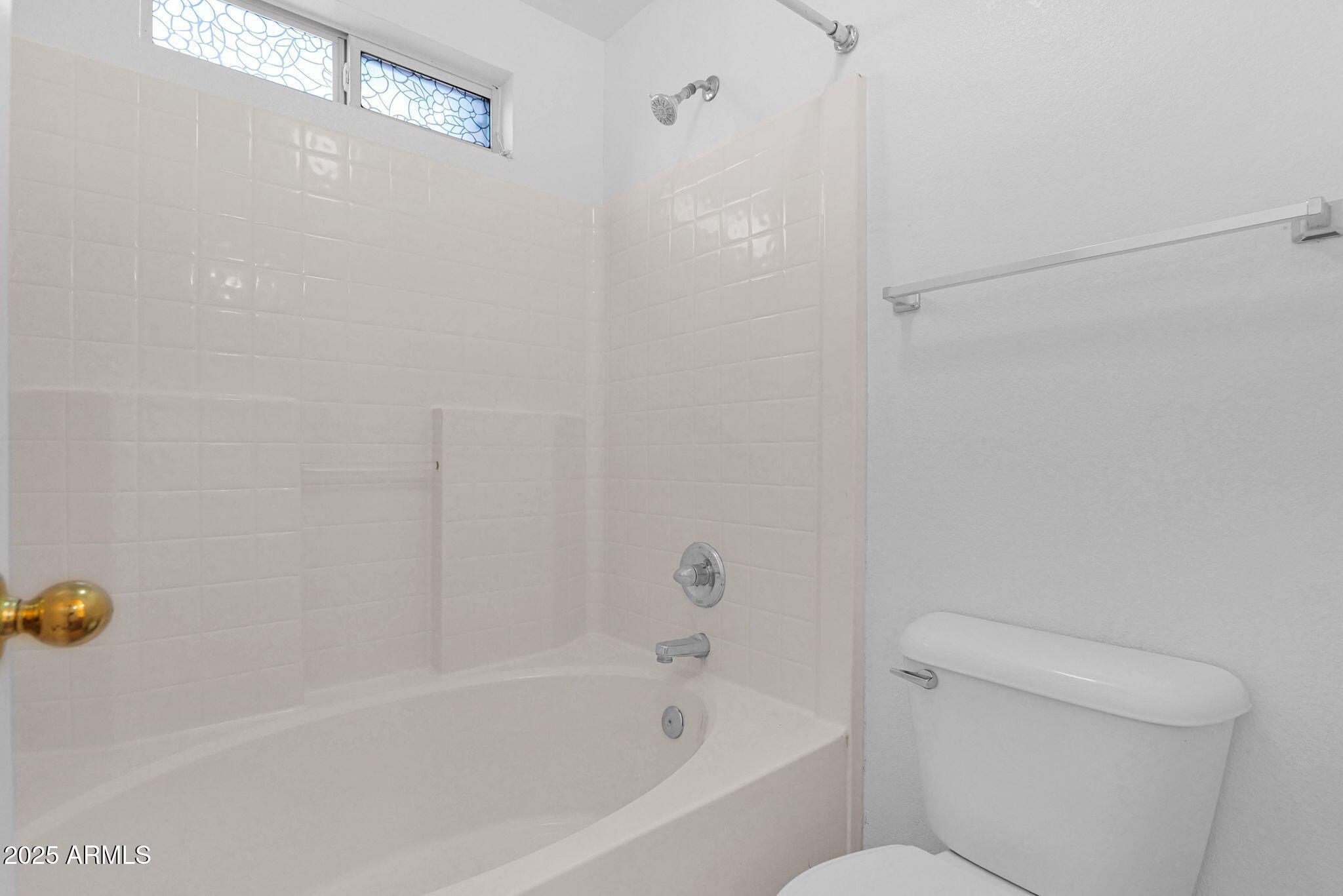 882 East Monterey Street Chandler, AZ 85225 - Photo 23 of 33 a bathroom with a bathtub and a shower