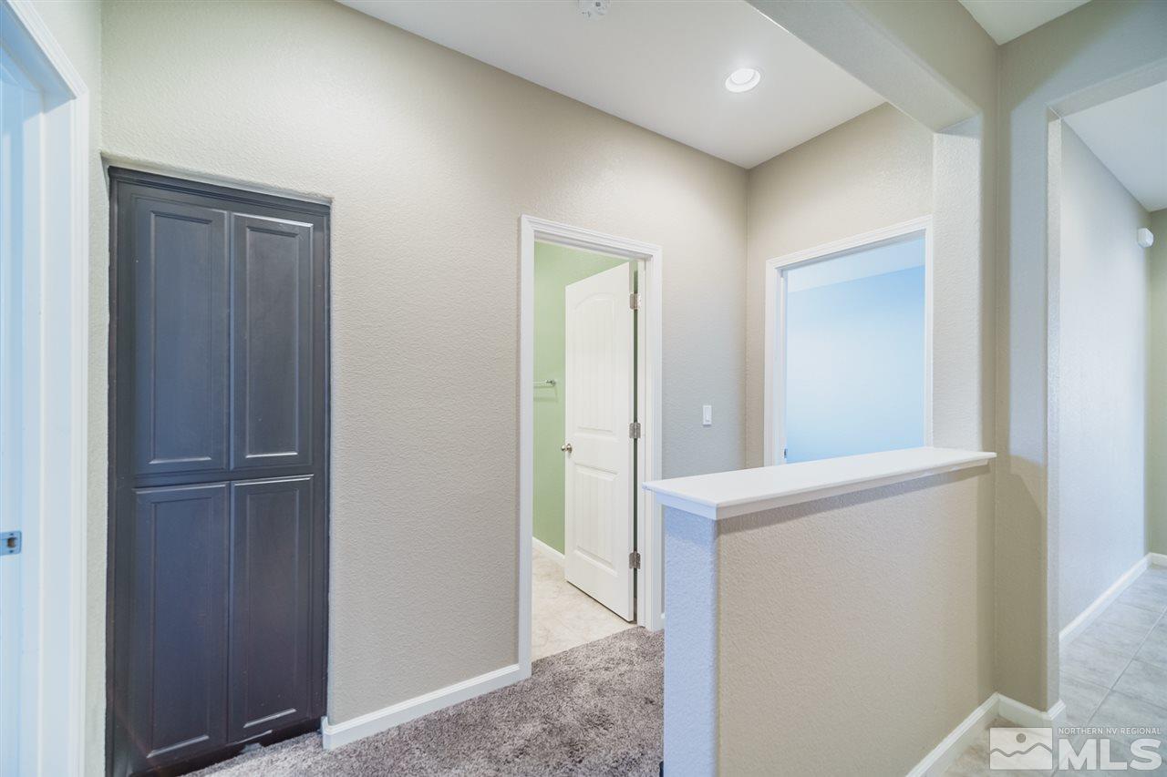 1930 Horse Prairie Road Reno, NV 89521 - Photo 3 of 34 a view of hallway with wooden floor