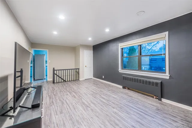 a view of a livingroom with a staircase