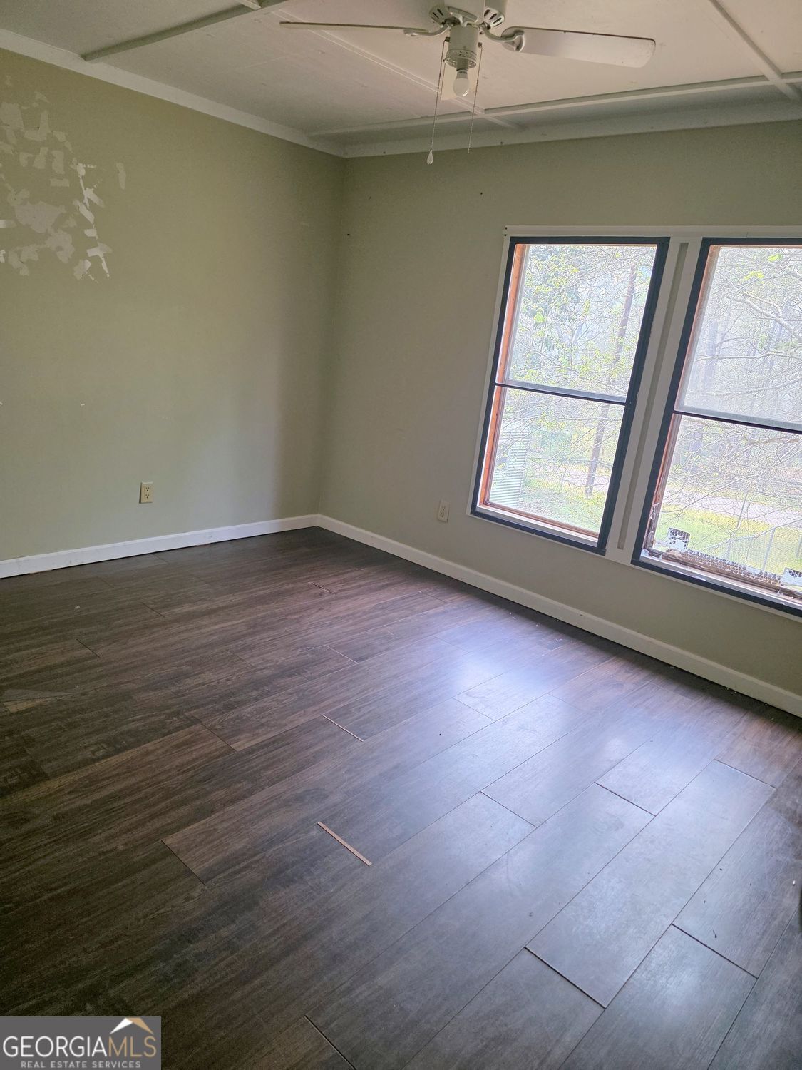 15 Shady Lane Jackson, GA 30233 - Photo 17 of 30 a view of room with window and wooden floor