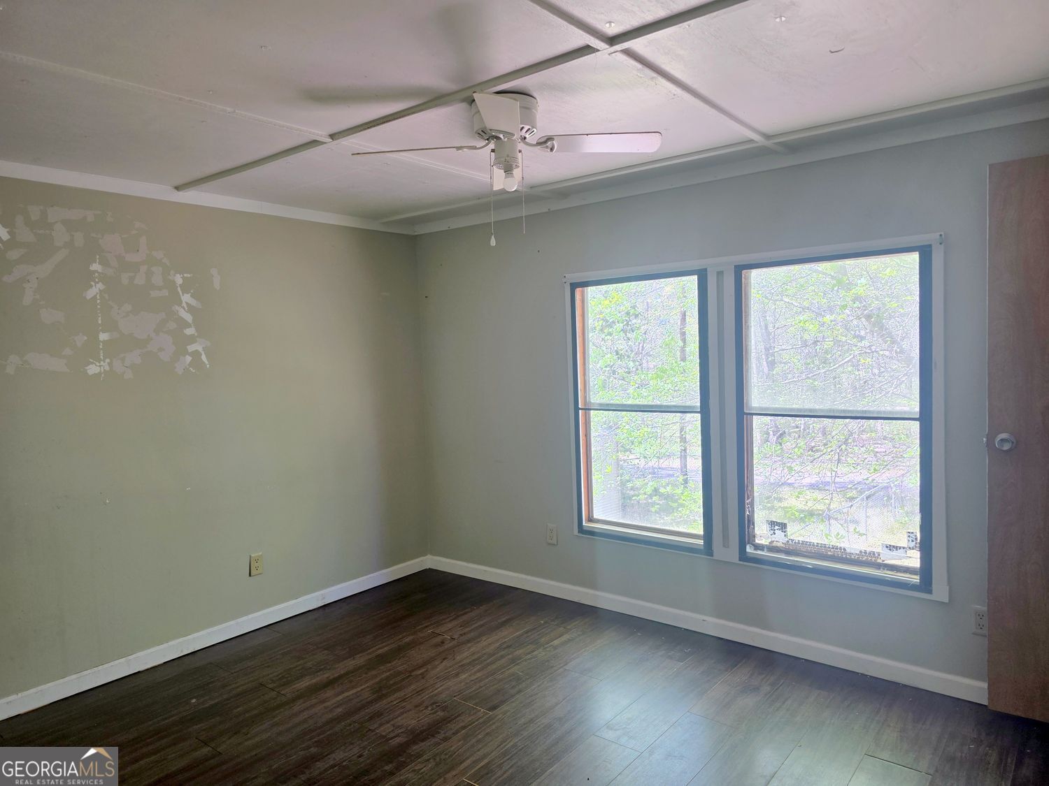 15 Shady Lane Jackson, GA 30233 - Photo 19 of 30 an empty room with wooden floor and windows