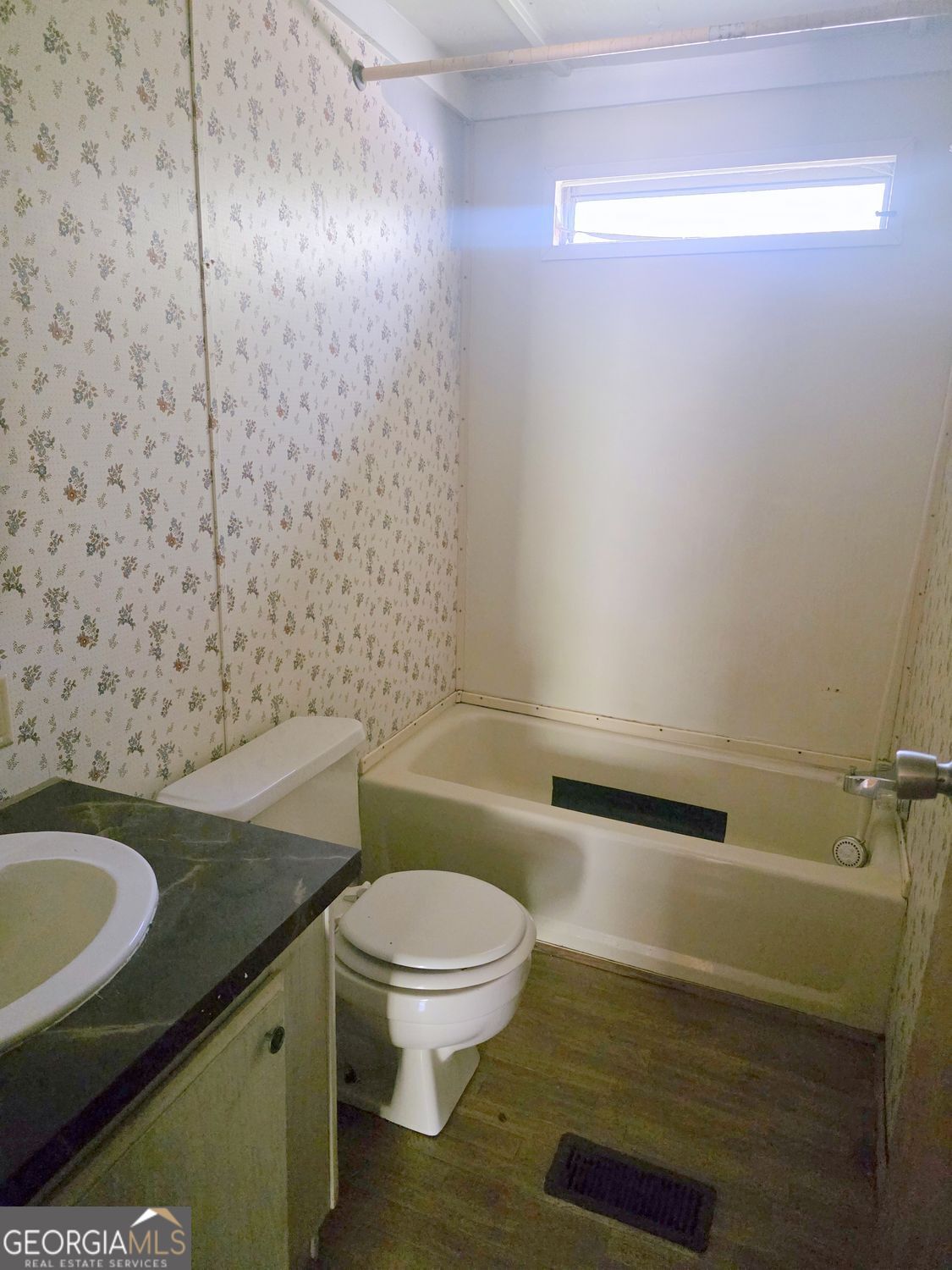 15 Shady Lane Jackson, GA 30233 - Photo 21 of 30 a bathroom with a granite countertop toilet and a sink