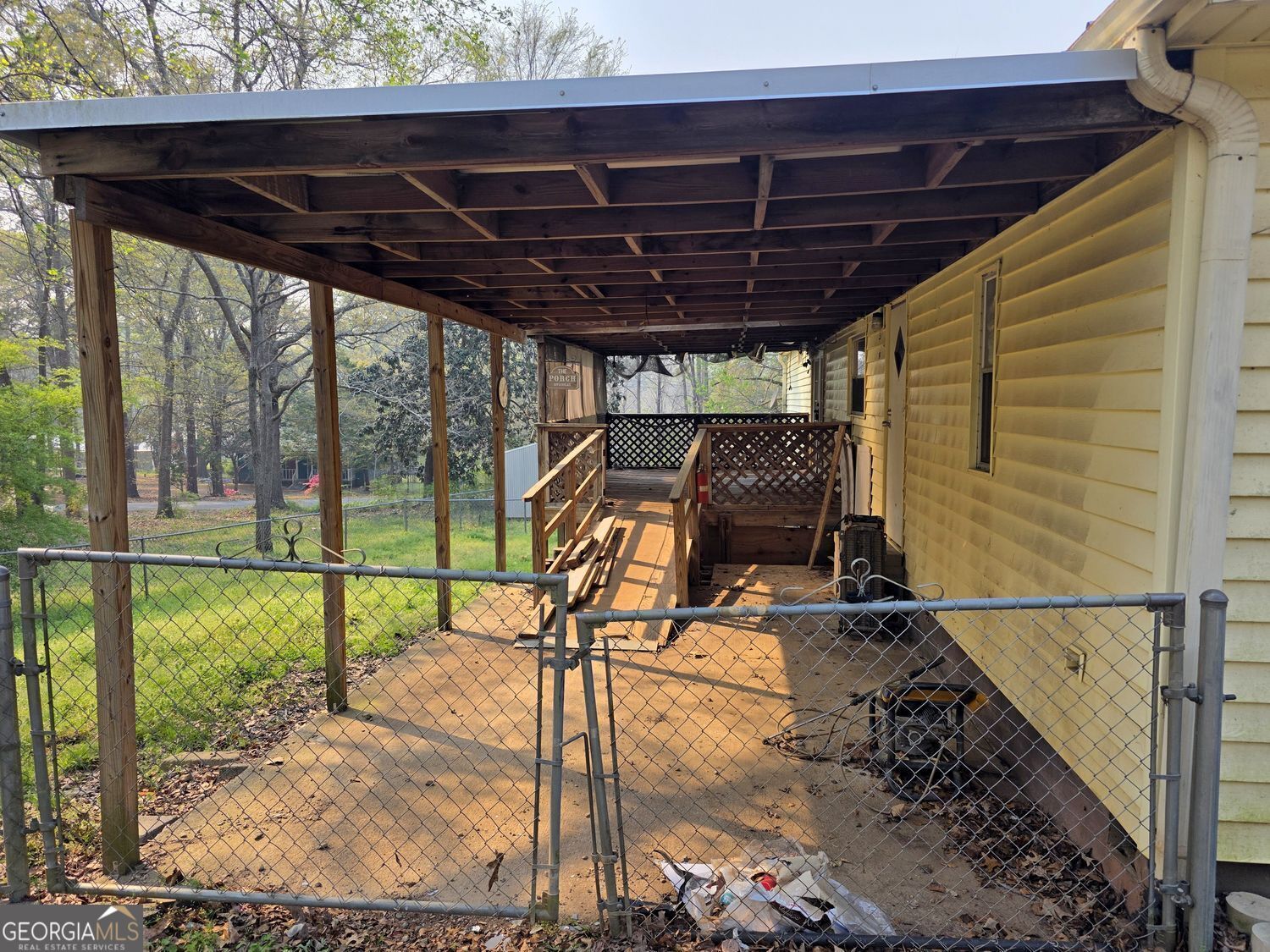 15 Shady Lane Jackson, GA 30233 - Photo 23 of 30 a view of a swimming pool with a porch