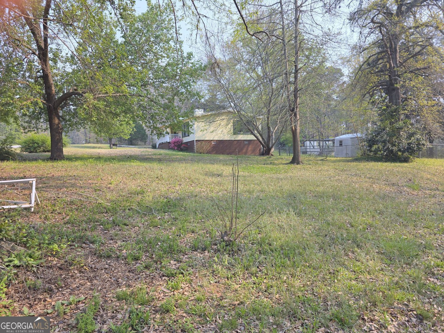 15 Shady Lane Jackson, GA 30233 - Photo 4 of 30 a backyard of a house with lots of green space