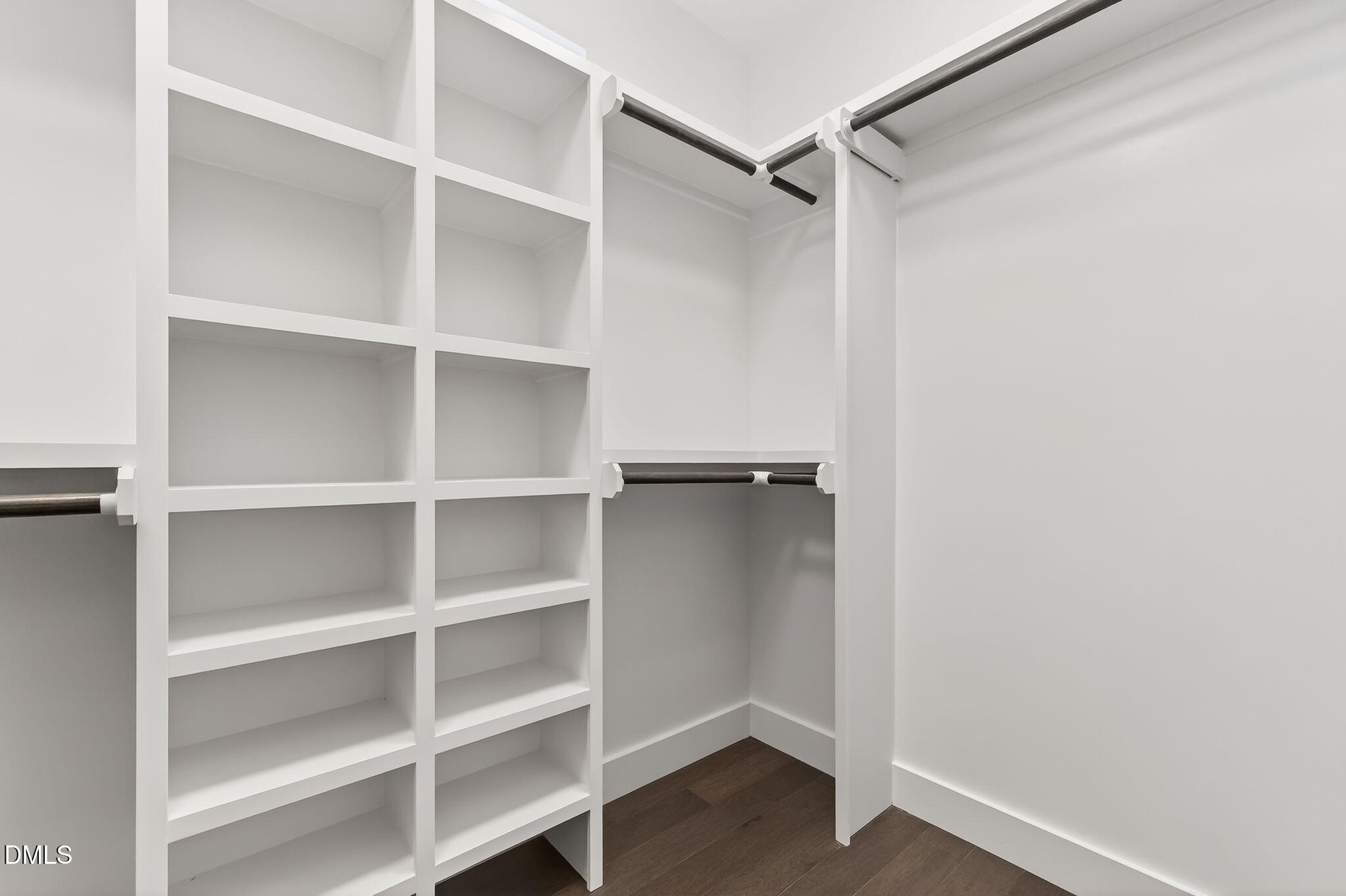 104 South Driver Street Durham, NC 27703 - Photo 32 of 53 a view of walk in closet with empty racks