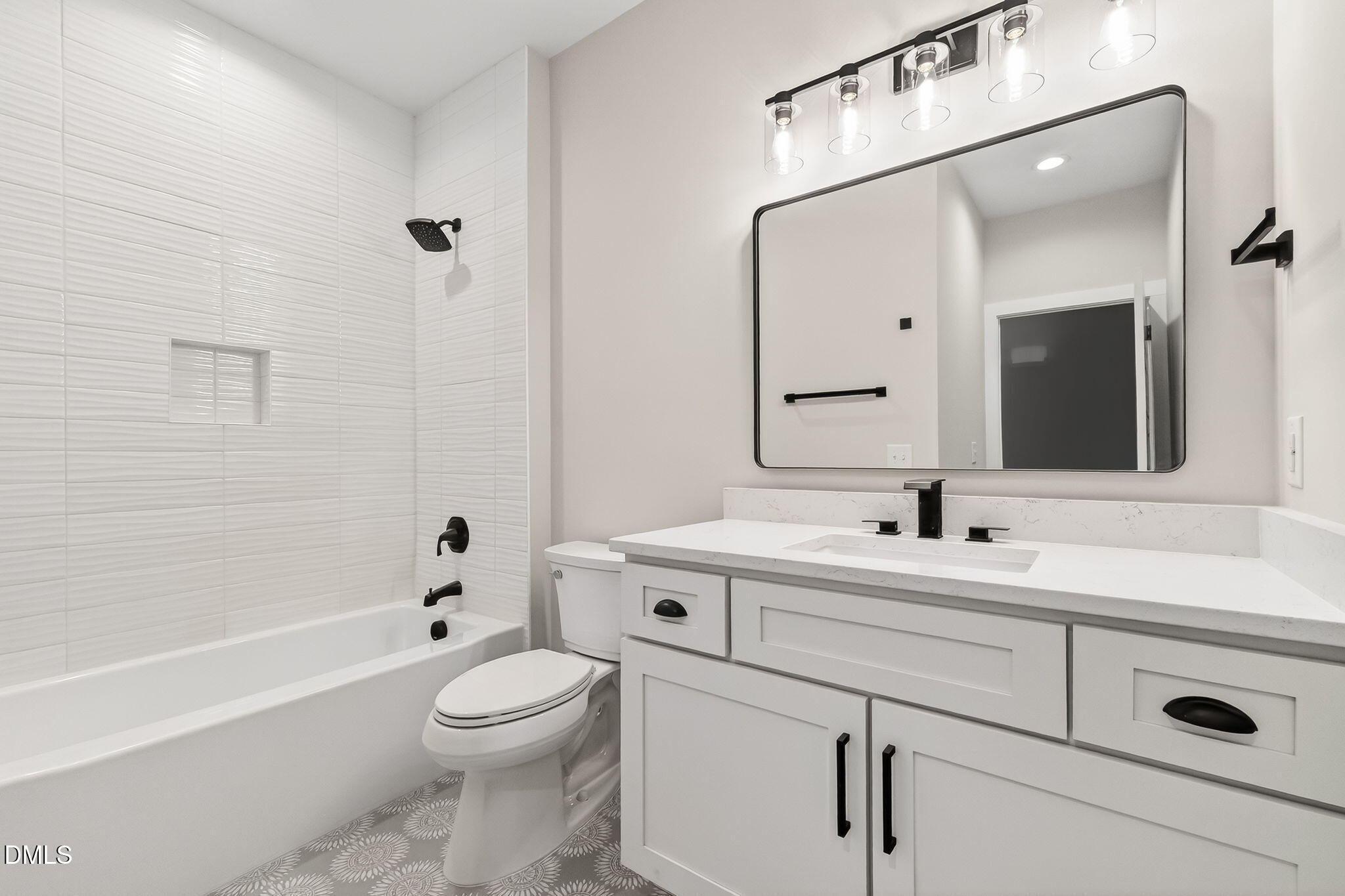 104 South Driver Street Durham, NC 27703 - Photo 36 of 53 a bathroom with a toilet a sink a mirror a bathtub and vanity