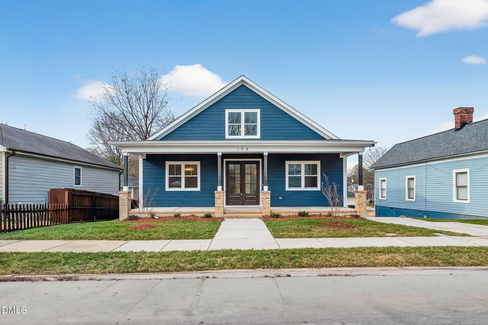 104 South Driver Street Durham, NC 27703 - Photo 4 of 53 a front view of a house with a yard