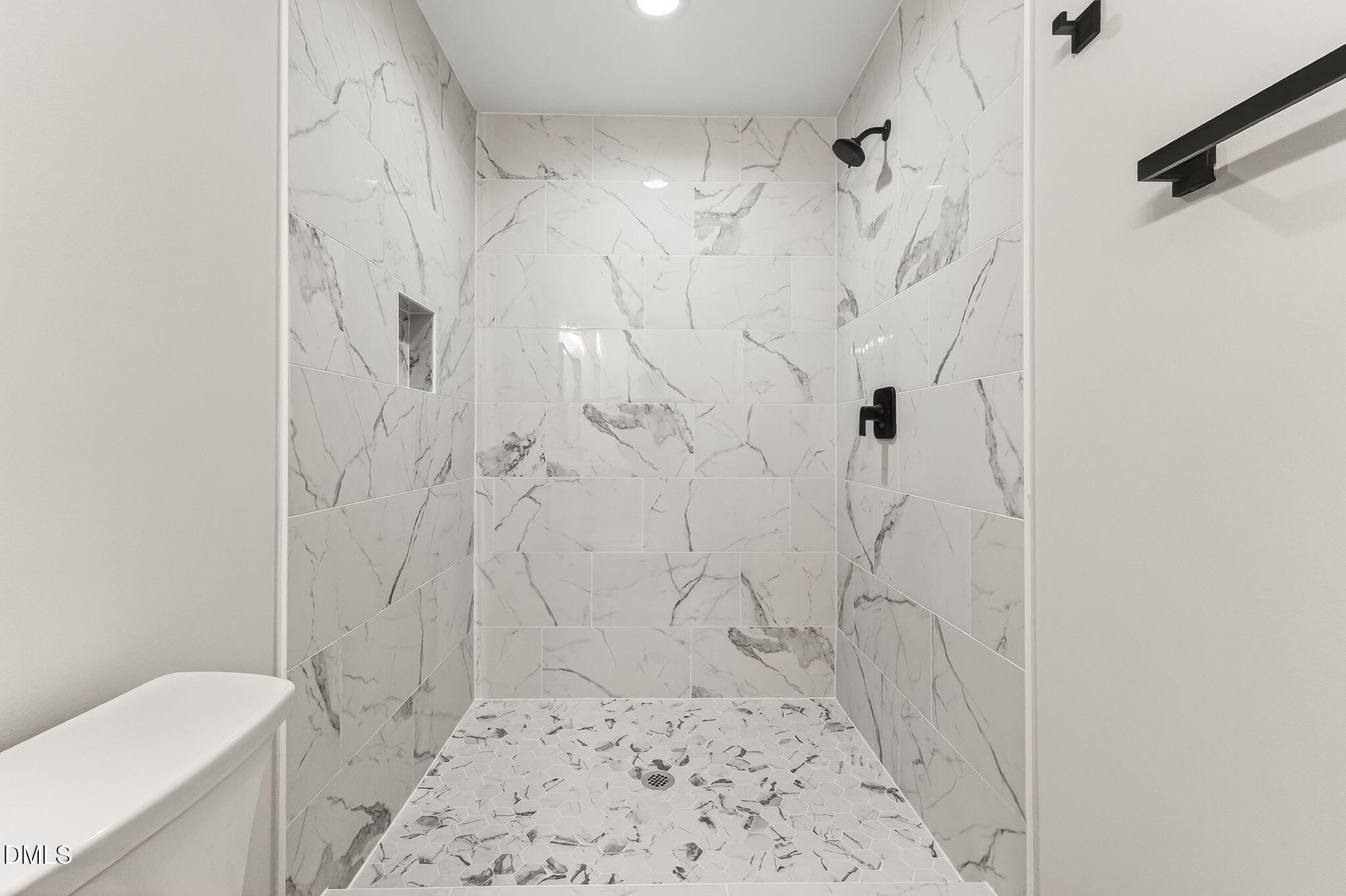 104 South Driver Street Durham, NC 27703 - Photo 44 of 53 a bathroom with a shower and a toilet