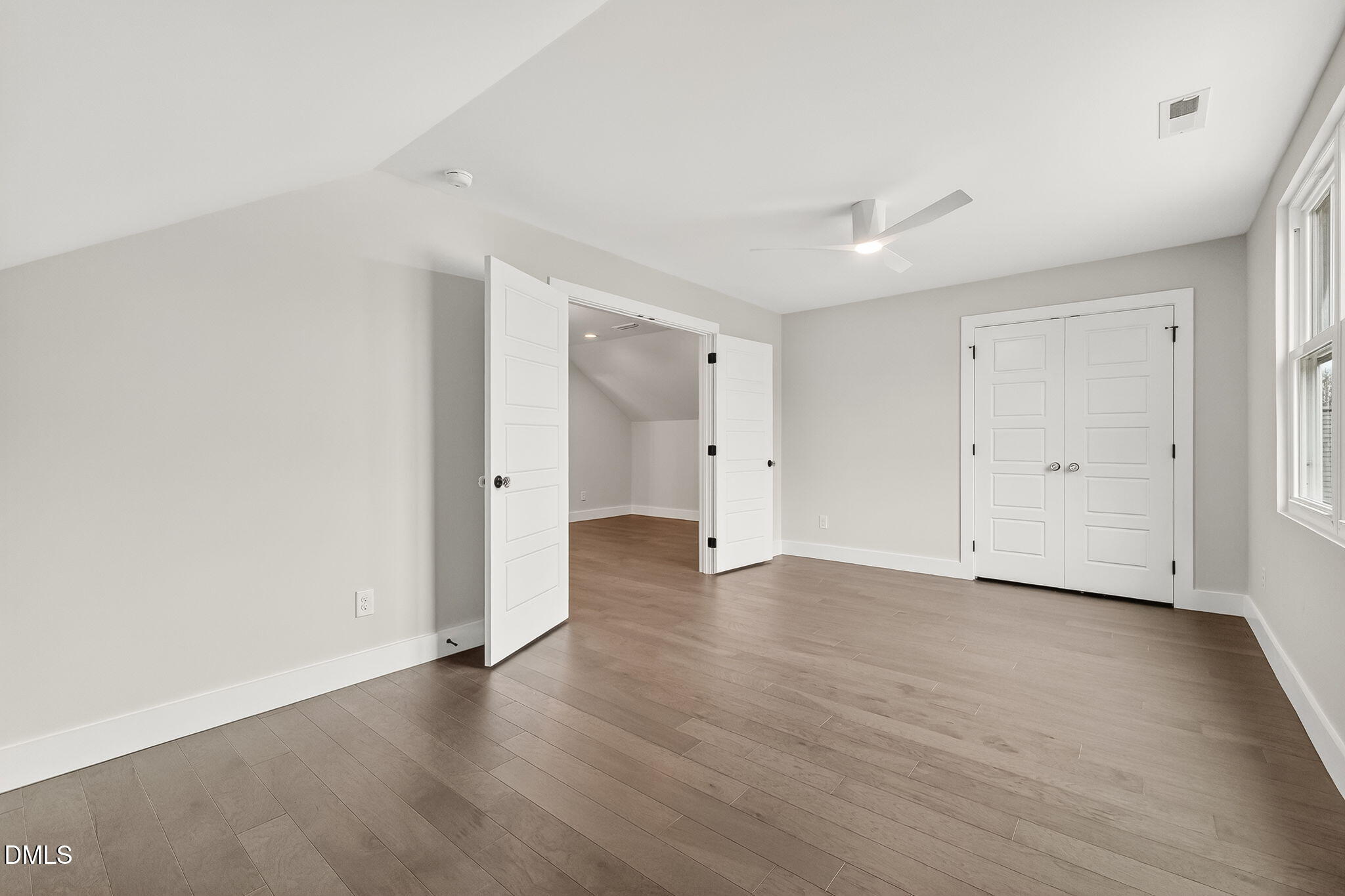 104 South Driver Street Durham, NC 27703 - Photo 46 of 53 a view of an empty room with wooden floor