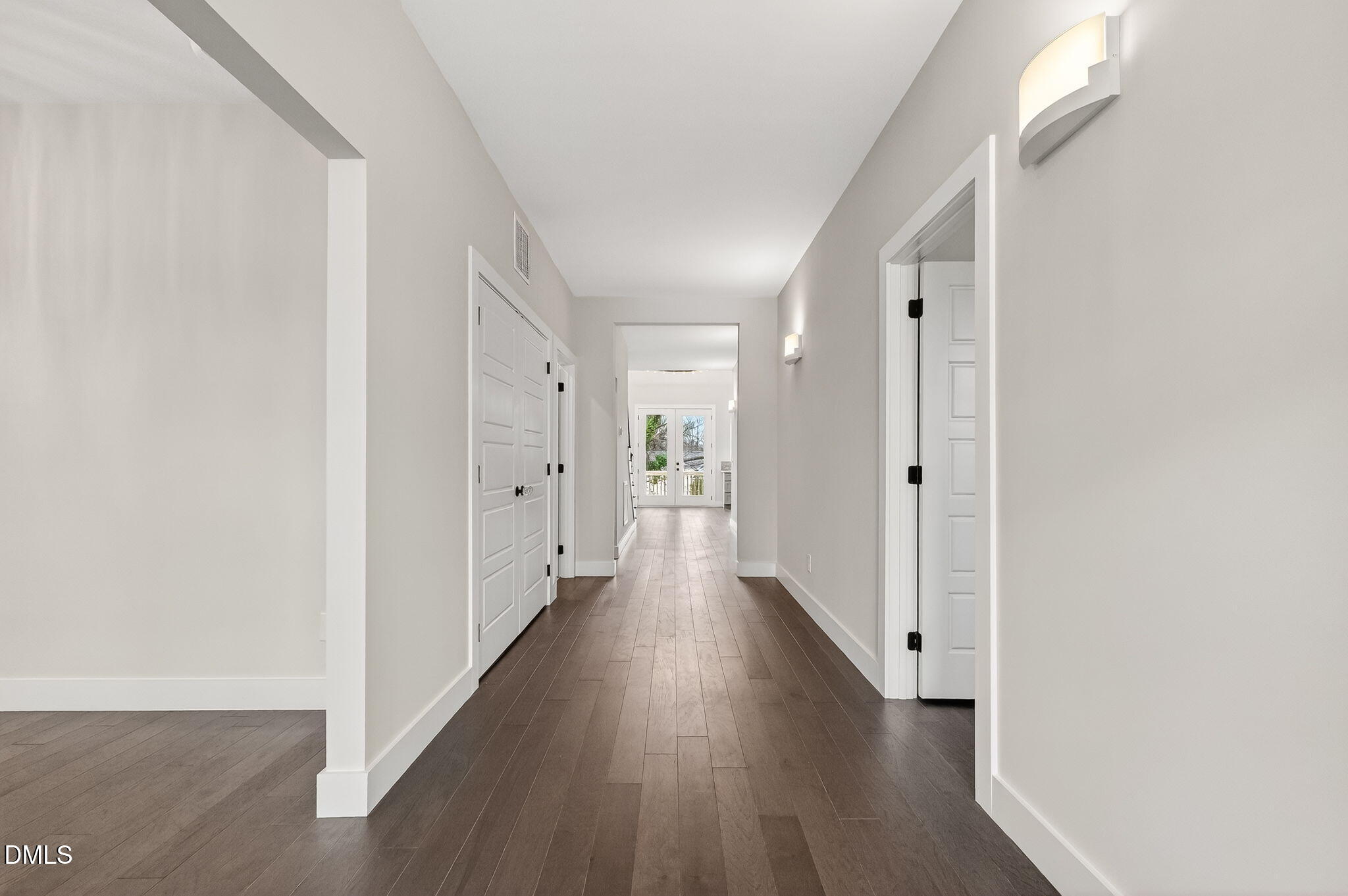 104 South Driver Street Durham, NC 27703 - Photo 5 of 53 a view of a hallway with wooden floor