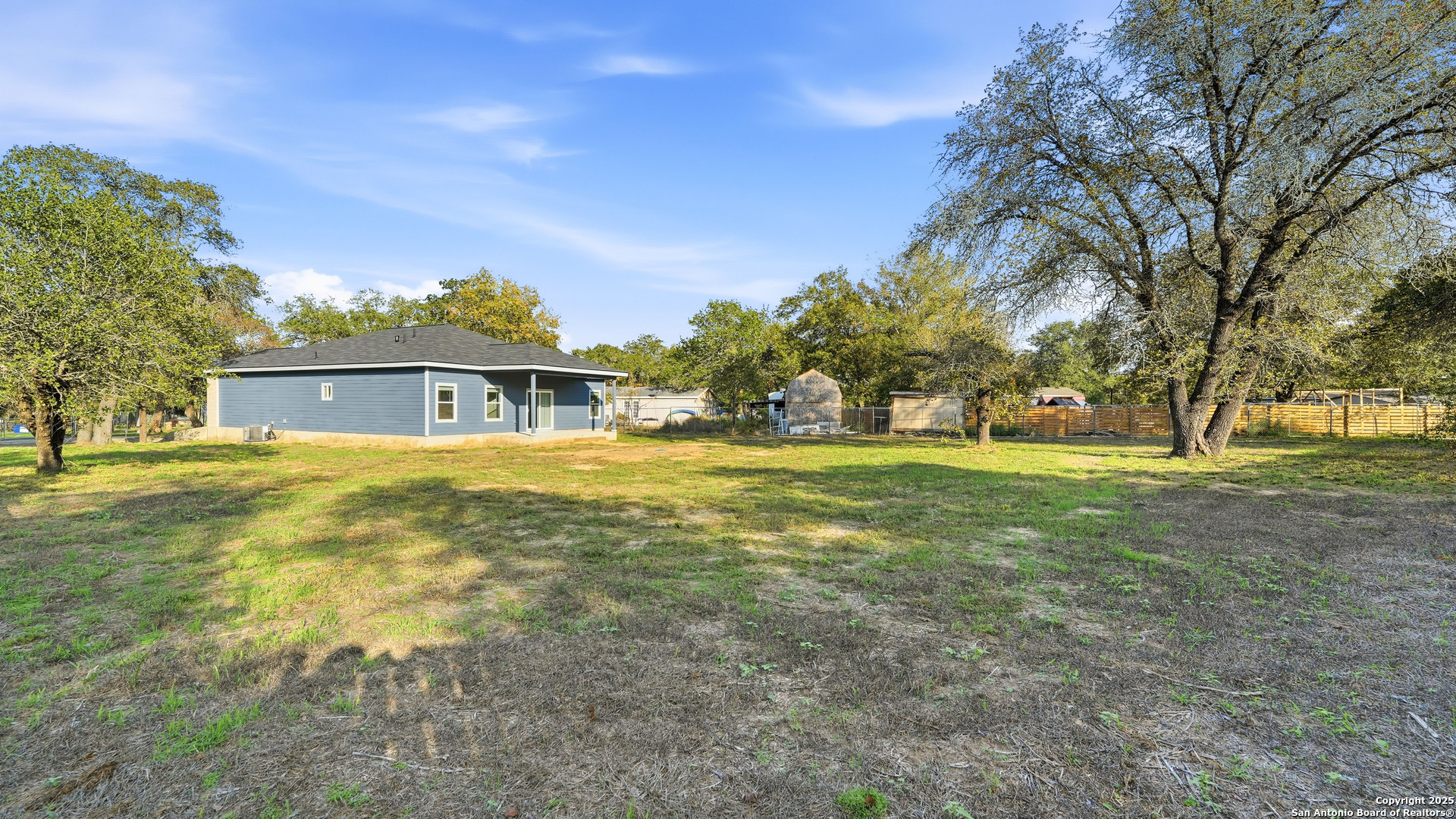 4606 Lee Way Elmendorf, TX 78112 - Photo 37 of 45 a front view of house with yard