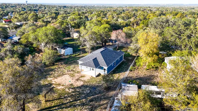 an aerial view of residential house with parking space