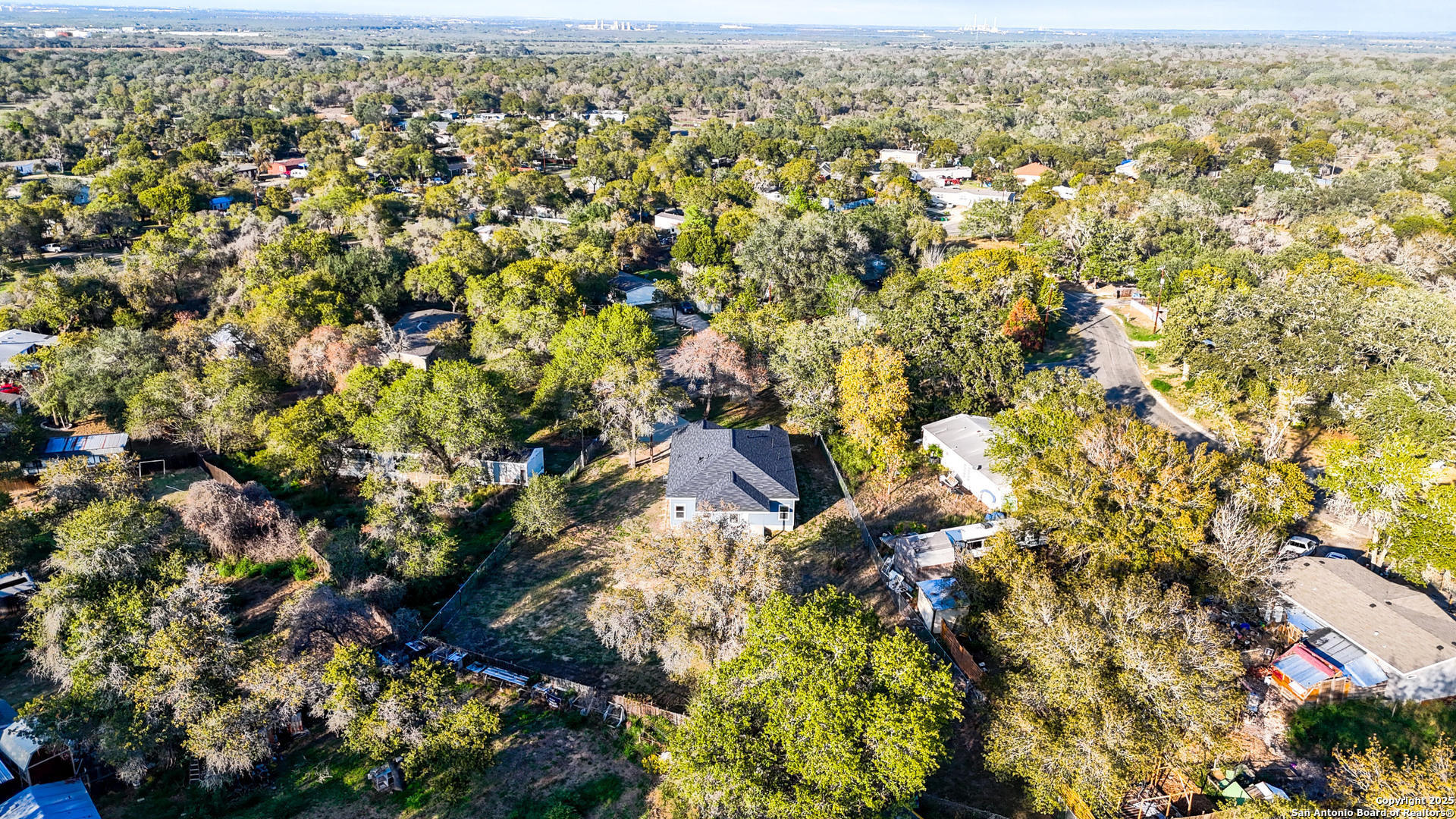 4606 Lee Way Elmendorf, TX 78112 - Photo 43 of 45 an aerial view of residential houses with outdoor space