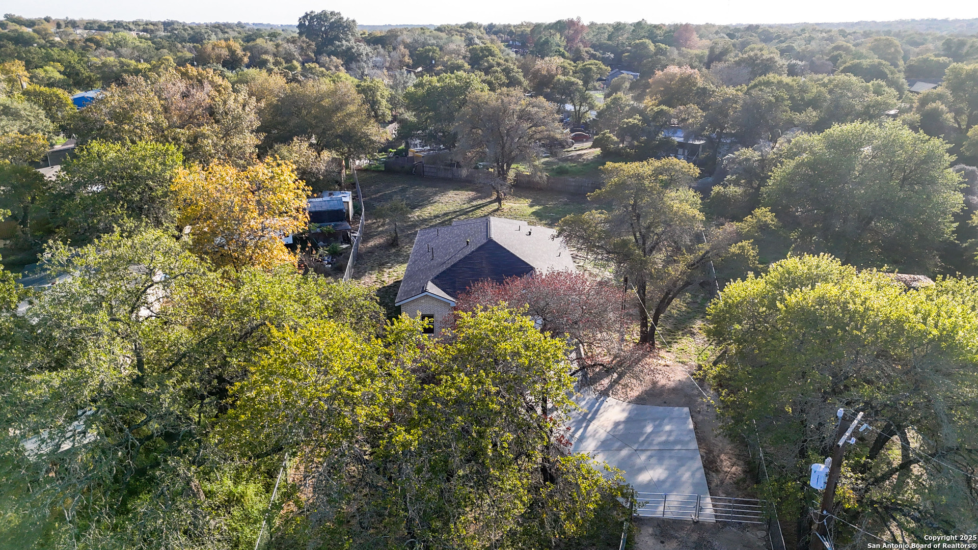 4606 Lee Way Elmendorf, TX 78112 - Photo 45 of 45 an aerial view of a house with a yard