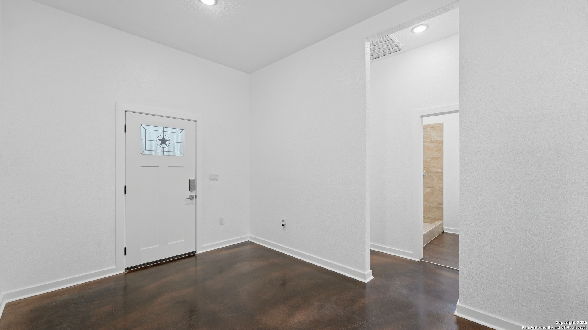 4606 Lee Way Elmendorf, TX 78112 - Photo 6 of 45 an empty room with windows