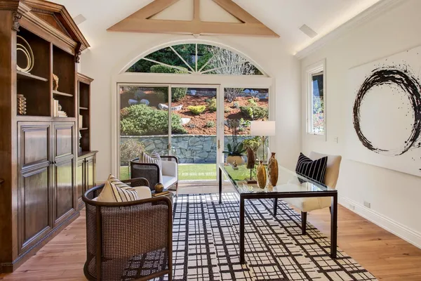a view of a dining room with furniture window and outside view