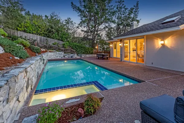 a view of an outdoor space with a swimming pool