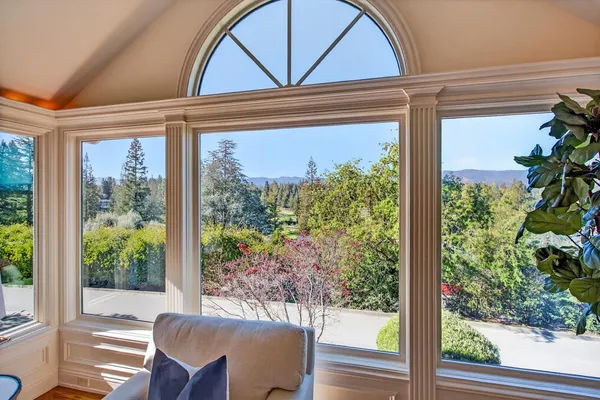 a view of a living room and a porch